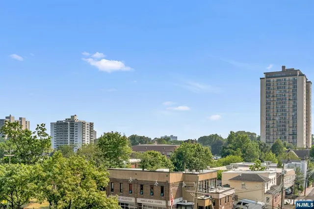 a view of a city with tall buildings
