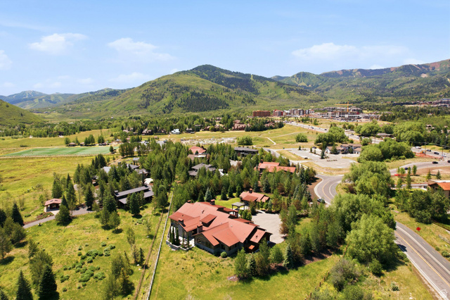 1575 Old Ranch Road Park City, UT 84098 - Photo 42 of 45 Expansive property featuring a multi-level structure with a red tile roof, surrounded by mature trees