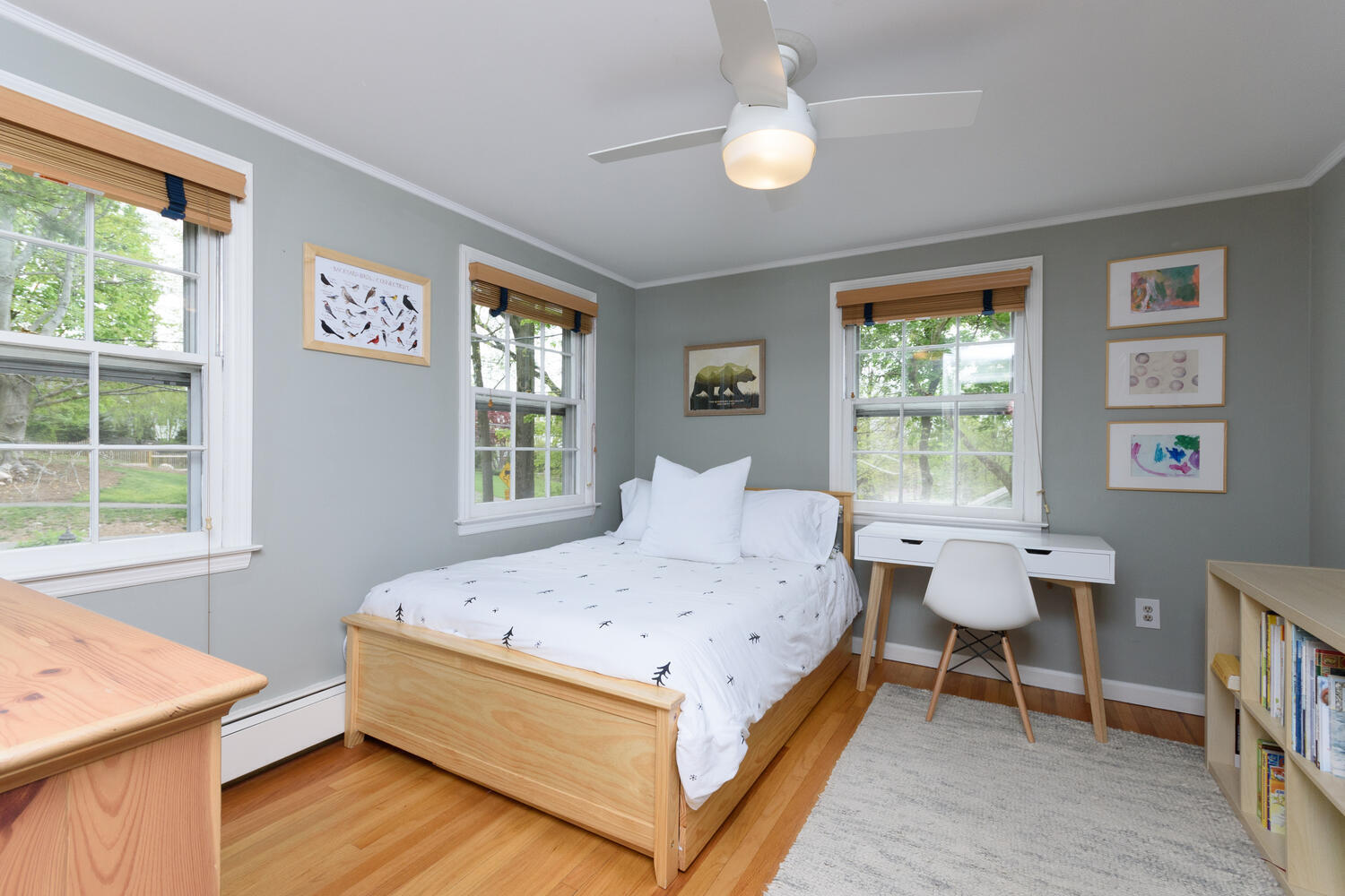 27 Hollow Tree Ridge Road Darien, CT 06820 - Photo 17 of 27 a bed sitting in a bedroom next to a window