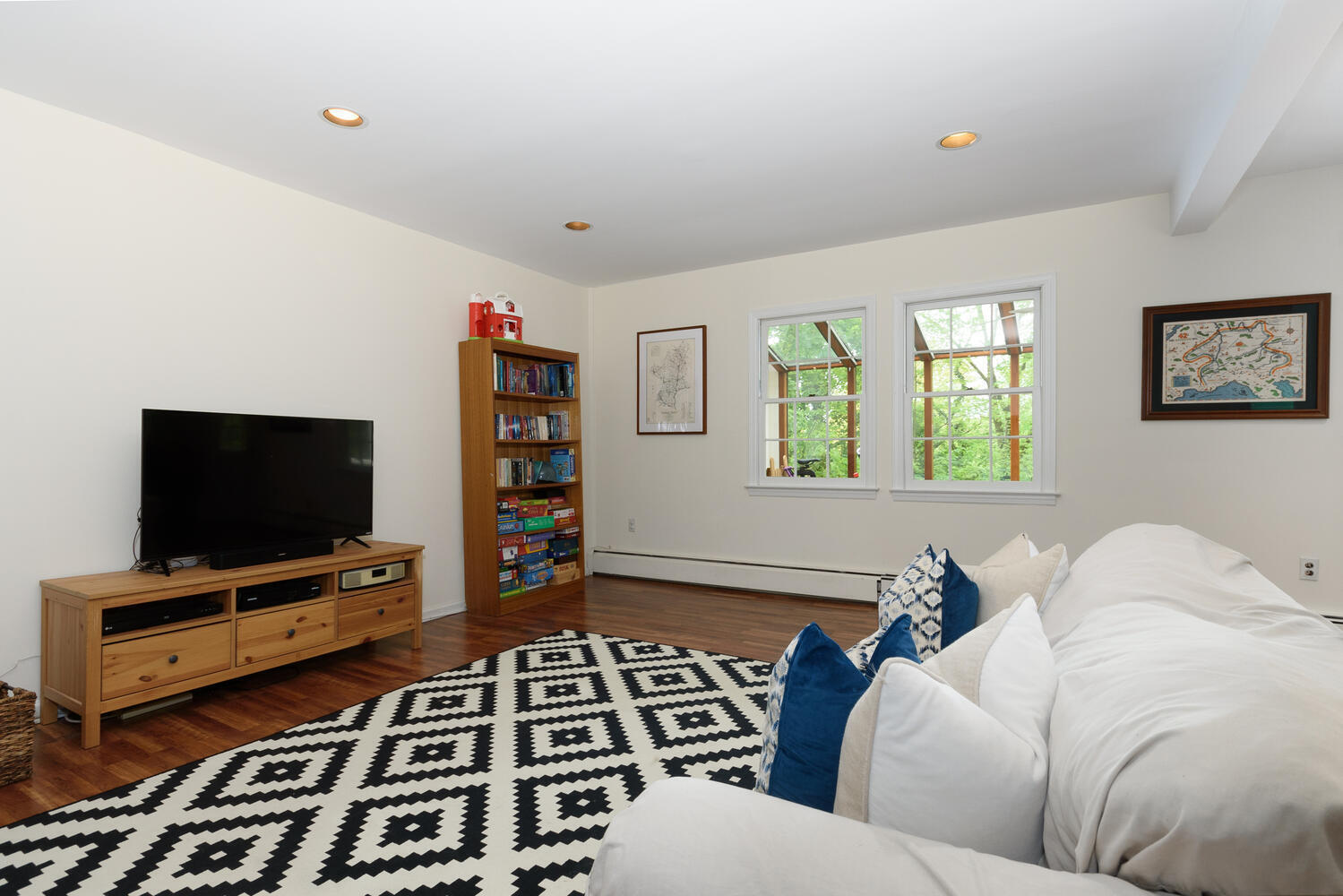 27 Hollow Tree Ridge Road Darien, CT 06820 - Photo 20 of 27 a living room with furniture and a flat screen tv