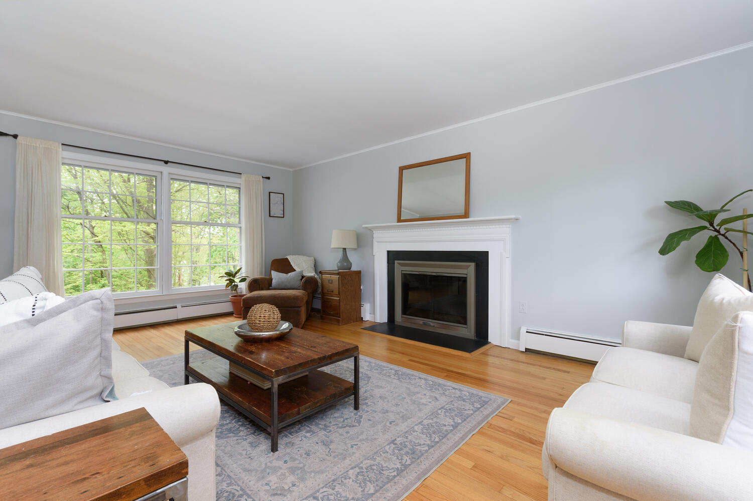 27 Hollow Tree Ridge Road Darien, CT 06820 - Photo 4 of 27 a living room with furniture and a fireplace