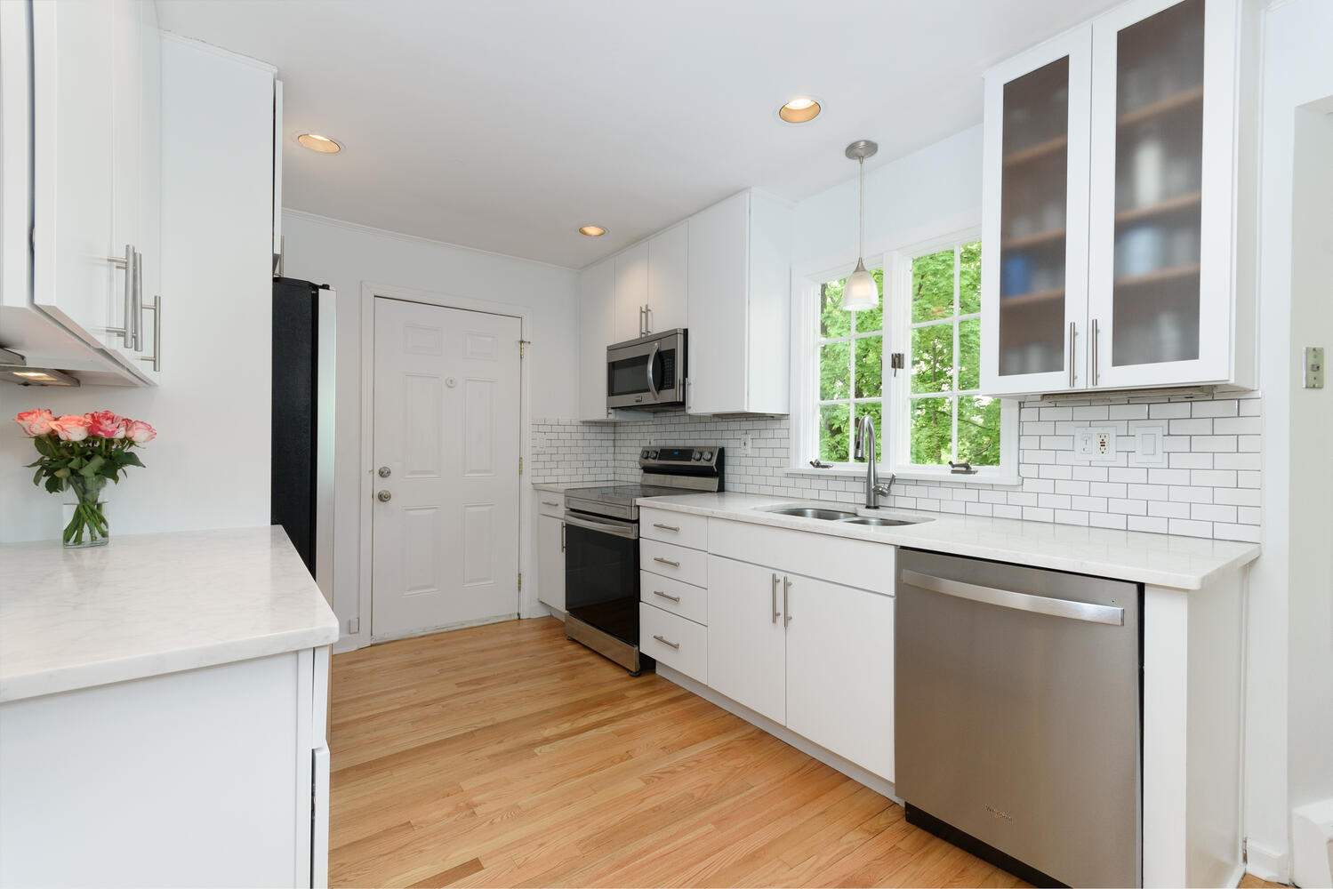 27 Hollow Tree Ridge Road Darien, CT 06820 - Photo 9 of 27 a kitchen with a sink stove and microwave