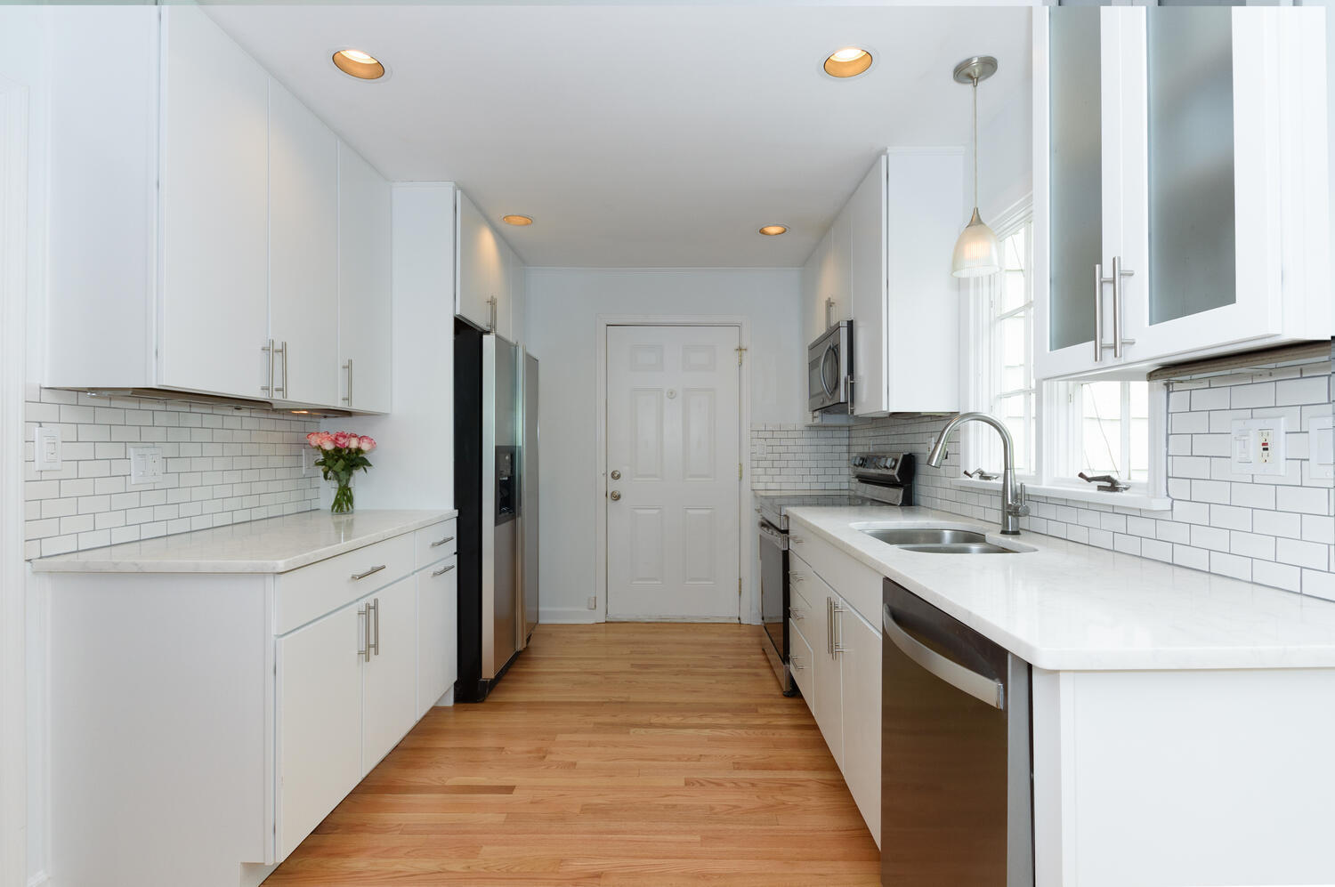 27 Hollow Tree Ridge Road Darien, CT 06820 - Photo 10 of 27 a kitchen with a sink stove and refrigerator