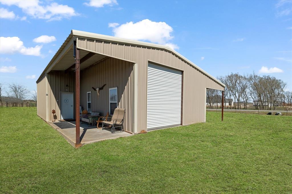 2885 Enloe Road Howe, TX 75459 - Photo 11 of 39 a view of backyard with barbeque grill and a small yard