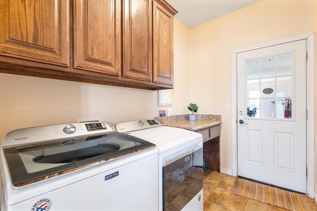 2885 Enloe Road Howe, TX 75459 - Photo 30 of 39 a utility room with dryer and washer