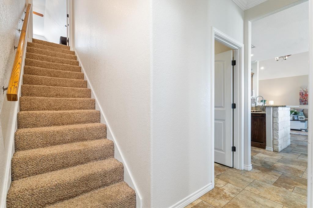 2885 Enloe Road Howe, TX 75459 - Photo 32 of 39 a view of staircase with white walls