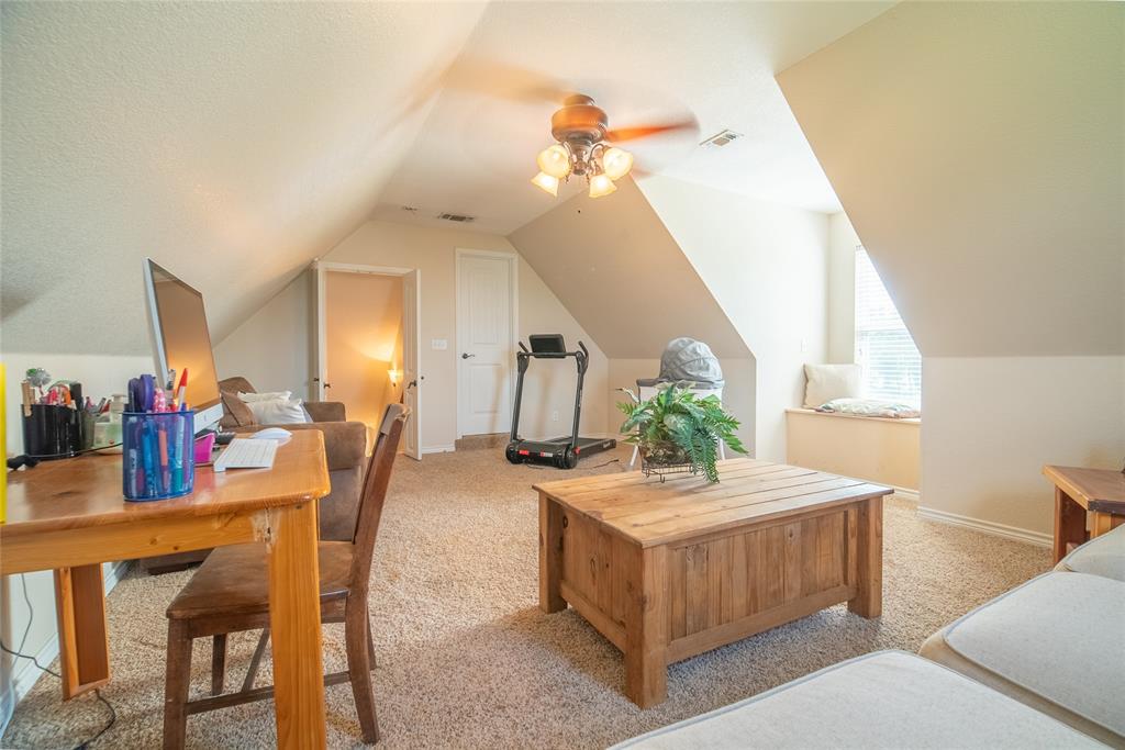 2885 Enloe Road Howe, TX 75459 - Photo 33 of 39 a dining room with a table and chairs