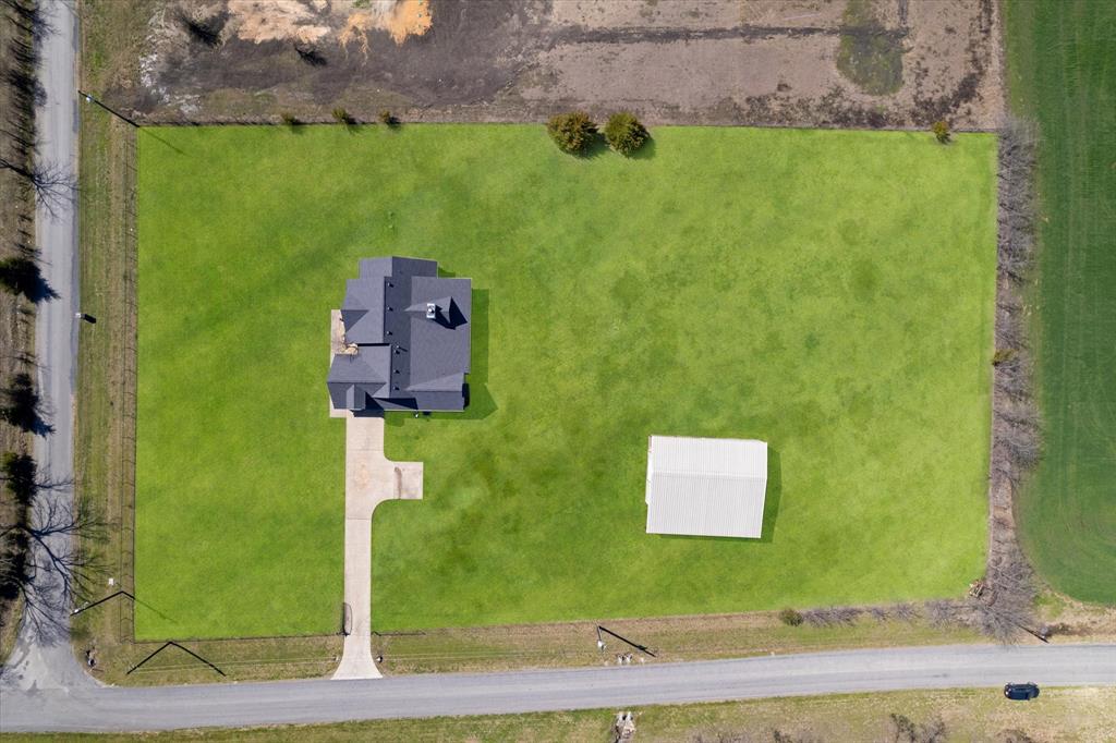 2885 Enloe Road Howe, TX 75459 - Photo 37 of 39 an aerial view of a house with a yard