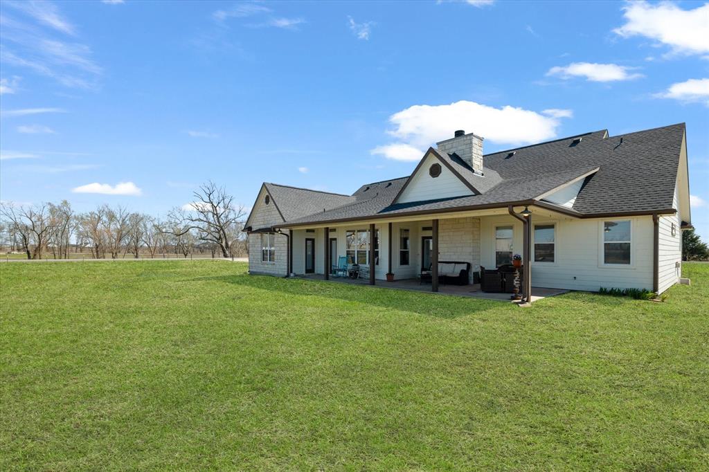 2885 Enloe Road Howe, TX 75459 - Photo 39 of 39 a view of a house with a yard and sitting area