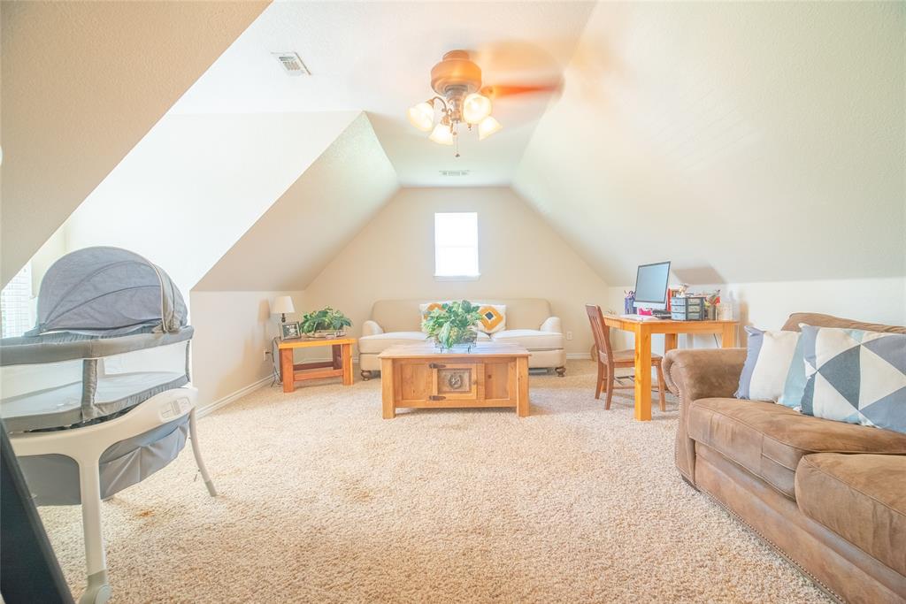 2885 Enloe Road Howe, TX 75459 - Photo 8 of 39 a living room with furniture