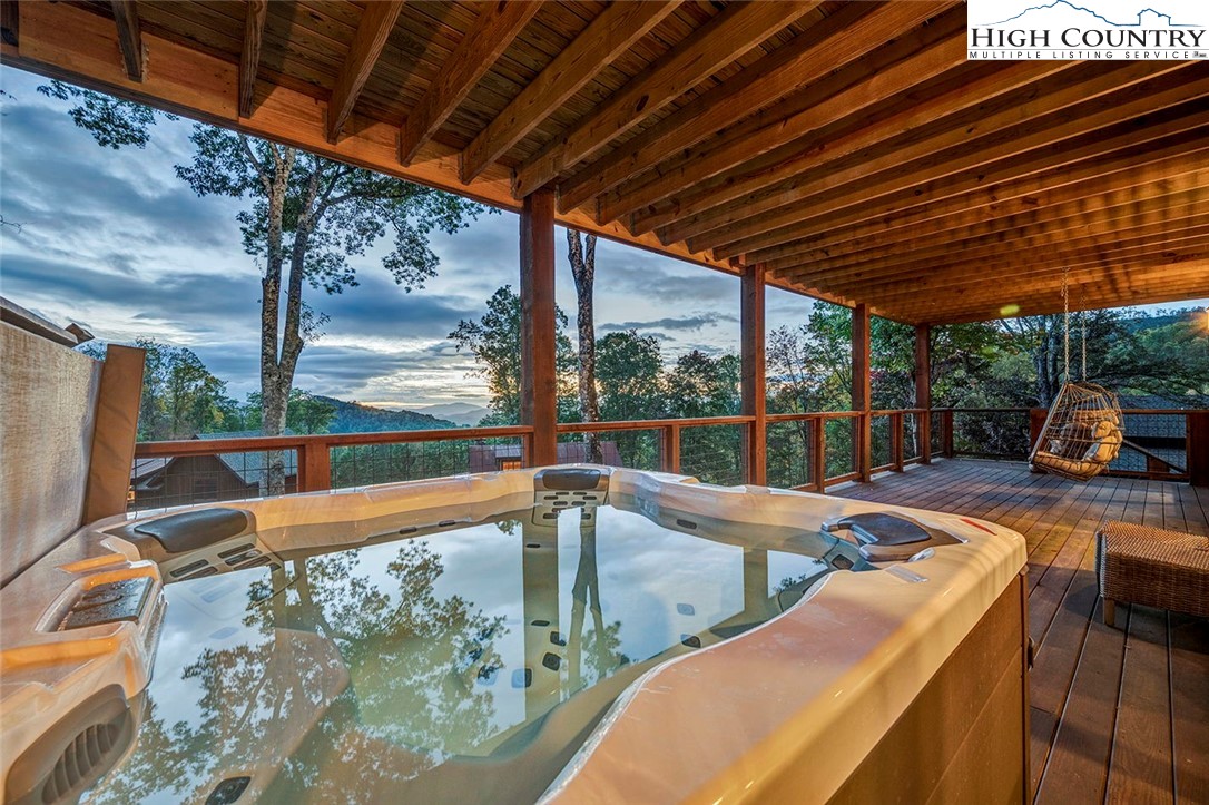 26 Frostfire Trail Banner Elk, NC 28604 - Photo 32 of 46 a view of a swimming pool with a patio