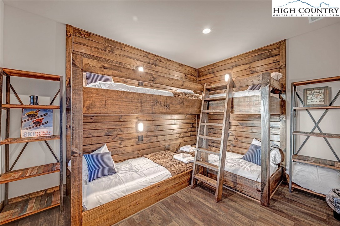 26 Frostfire Trail Banner Elk, NC 28604 - Photo 34 of 46 a bedroom with a bunk bed and a desk