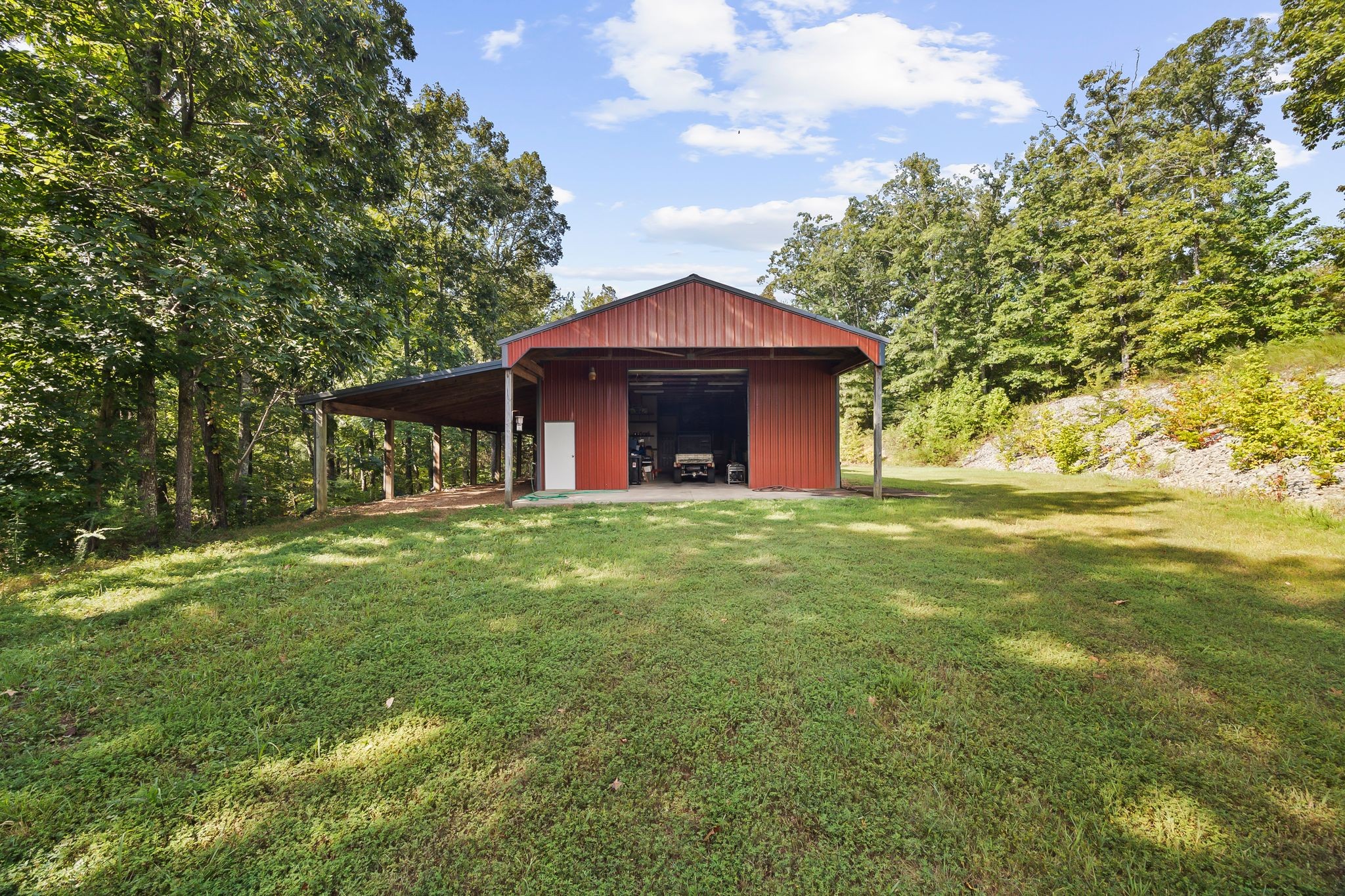 1582 Hellsneck Road Waverly, TN 37185 - Photo 14 of 72 a view of a house with a yard