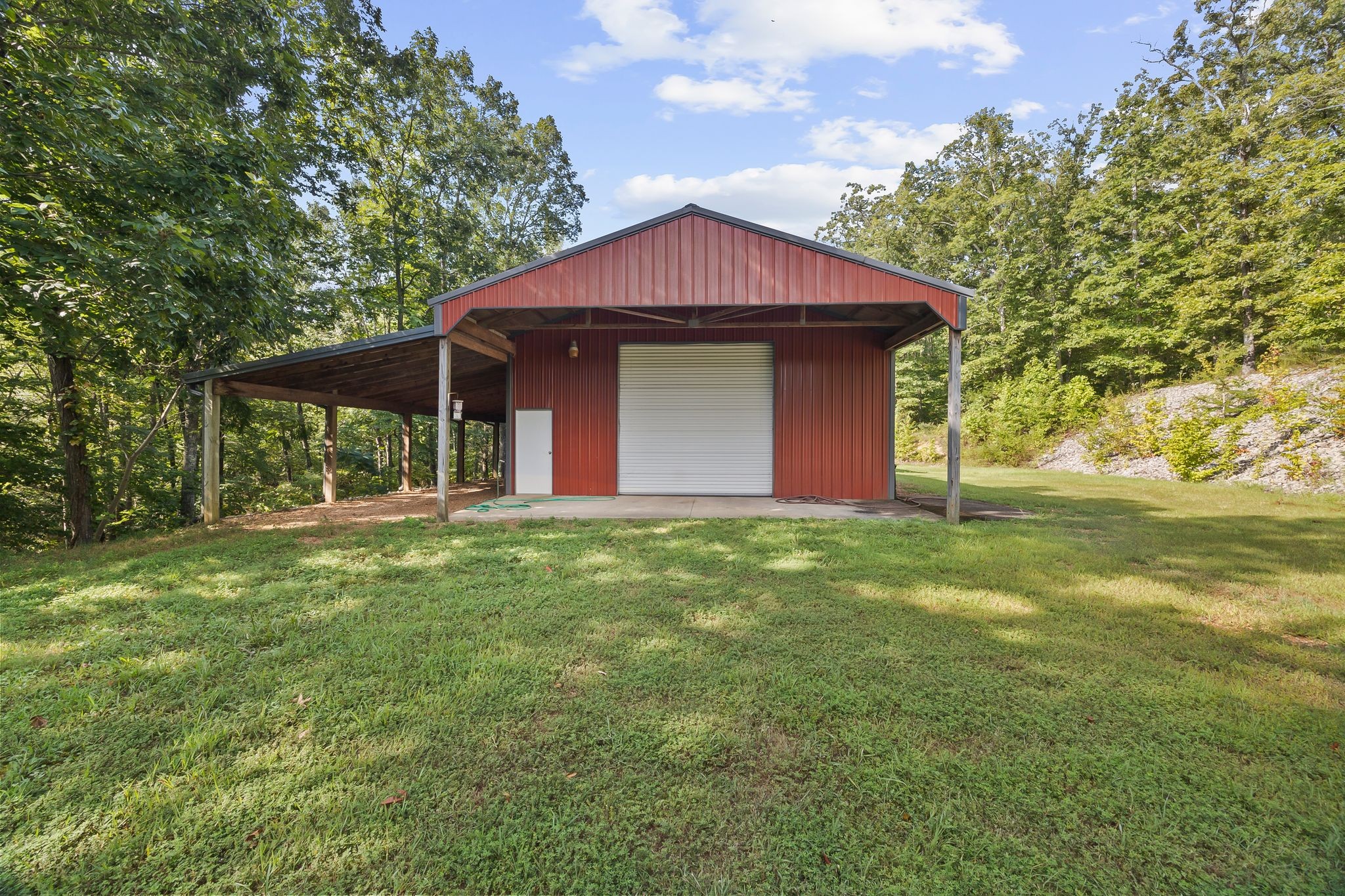 1582 Hellsneck Road Waverly, TN 37185 - Photo 15 of 72 a view of a house with a yard