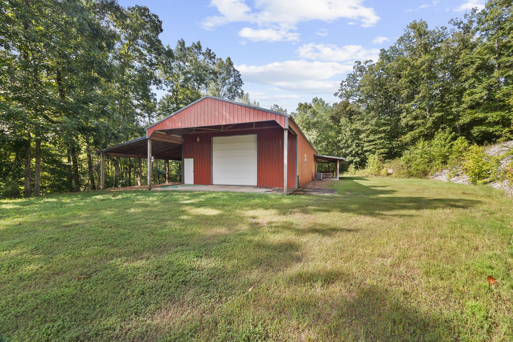 1582 Hellsneck Road Waverly, TN 37185 - Photo 16 of 72 a view of a house with a yard