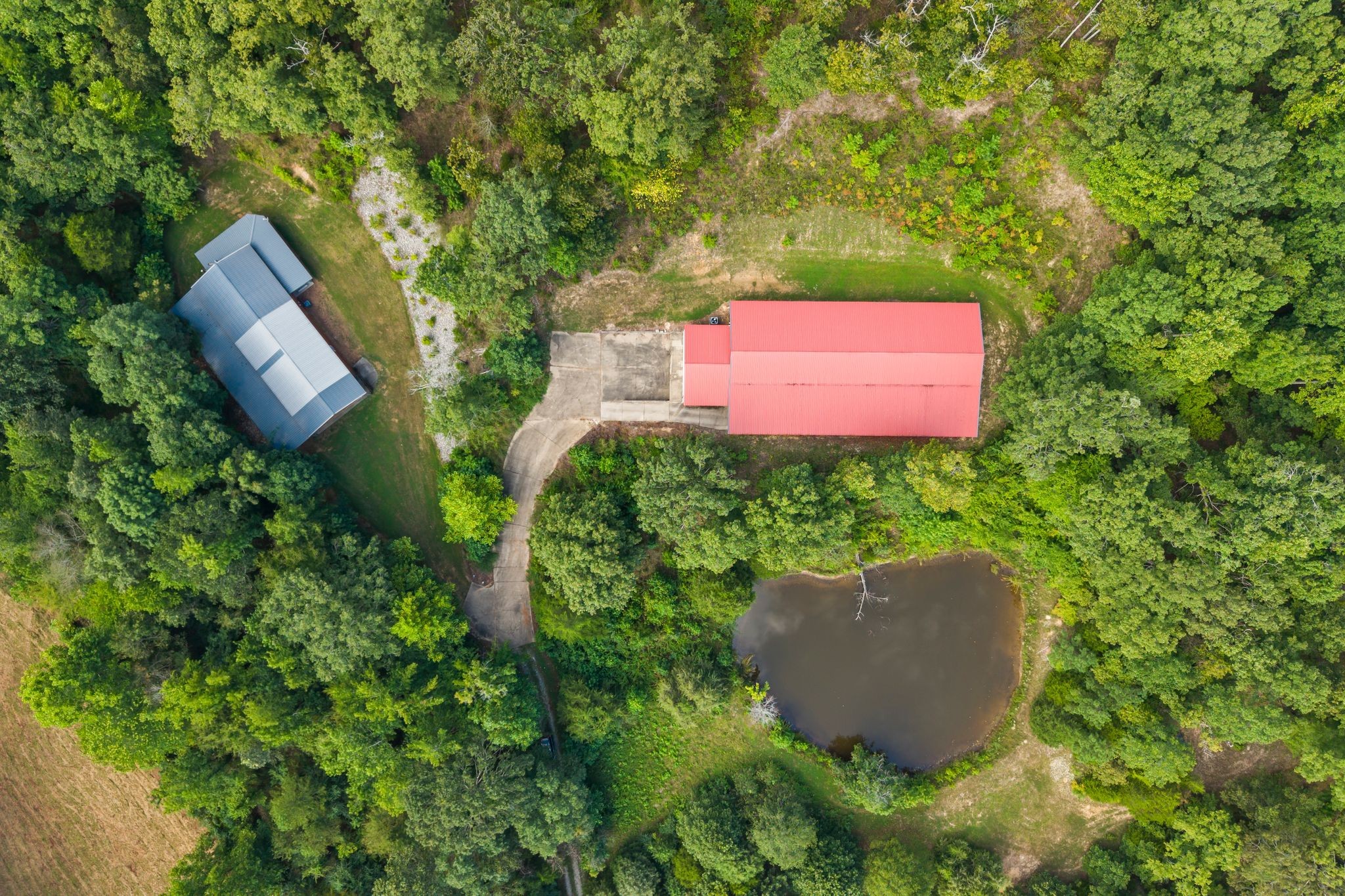 1582 Hellsneck Road Waverly, TN 37185 - Photo 19 of 72 an aerial view of a house with yard and outdoor seating