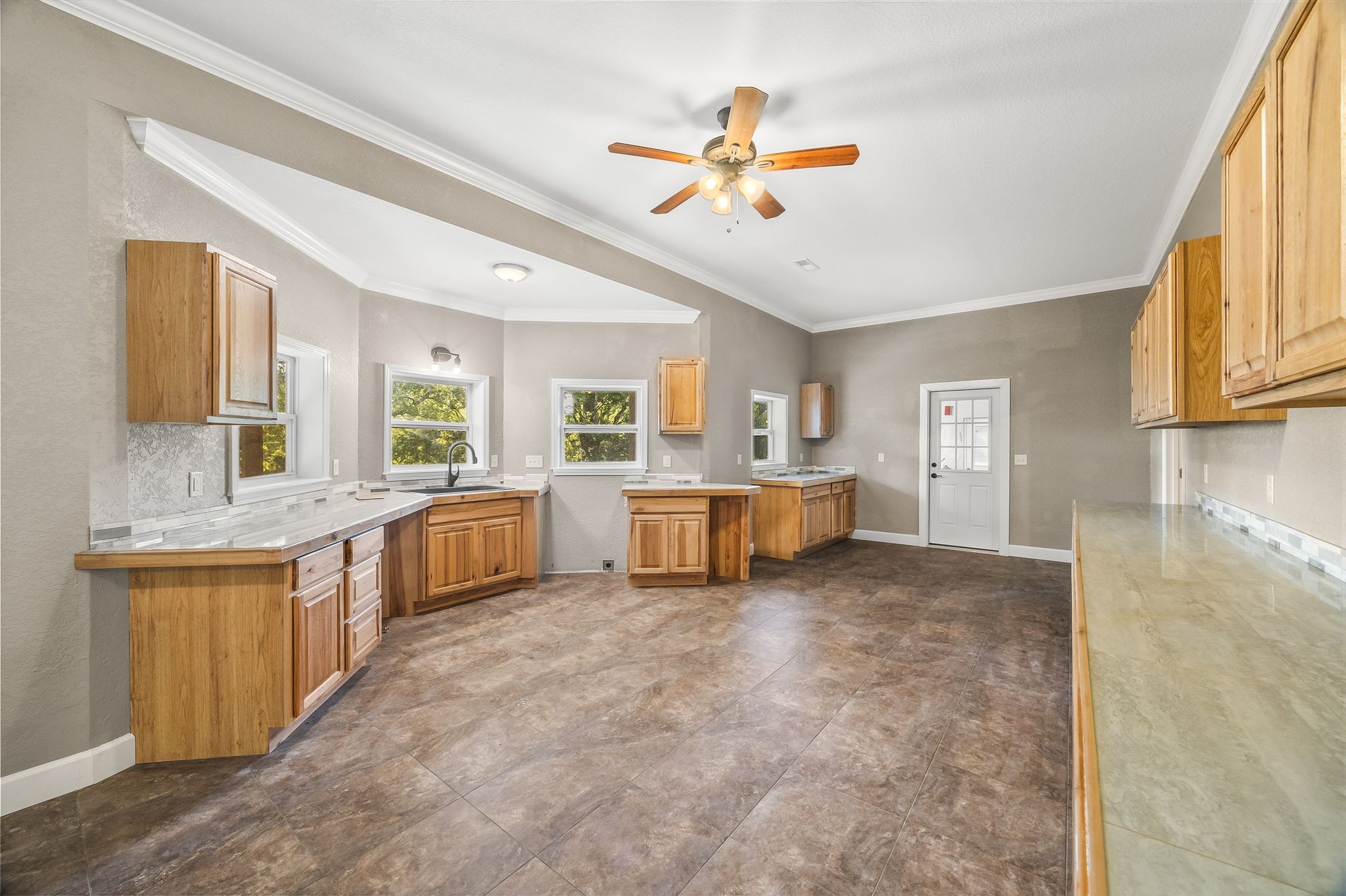 1582 Hellsneck Road Waverly, TN 37185 - Photo 30 of 72 a large white kitchen with a large window
