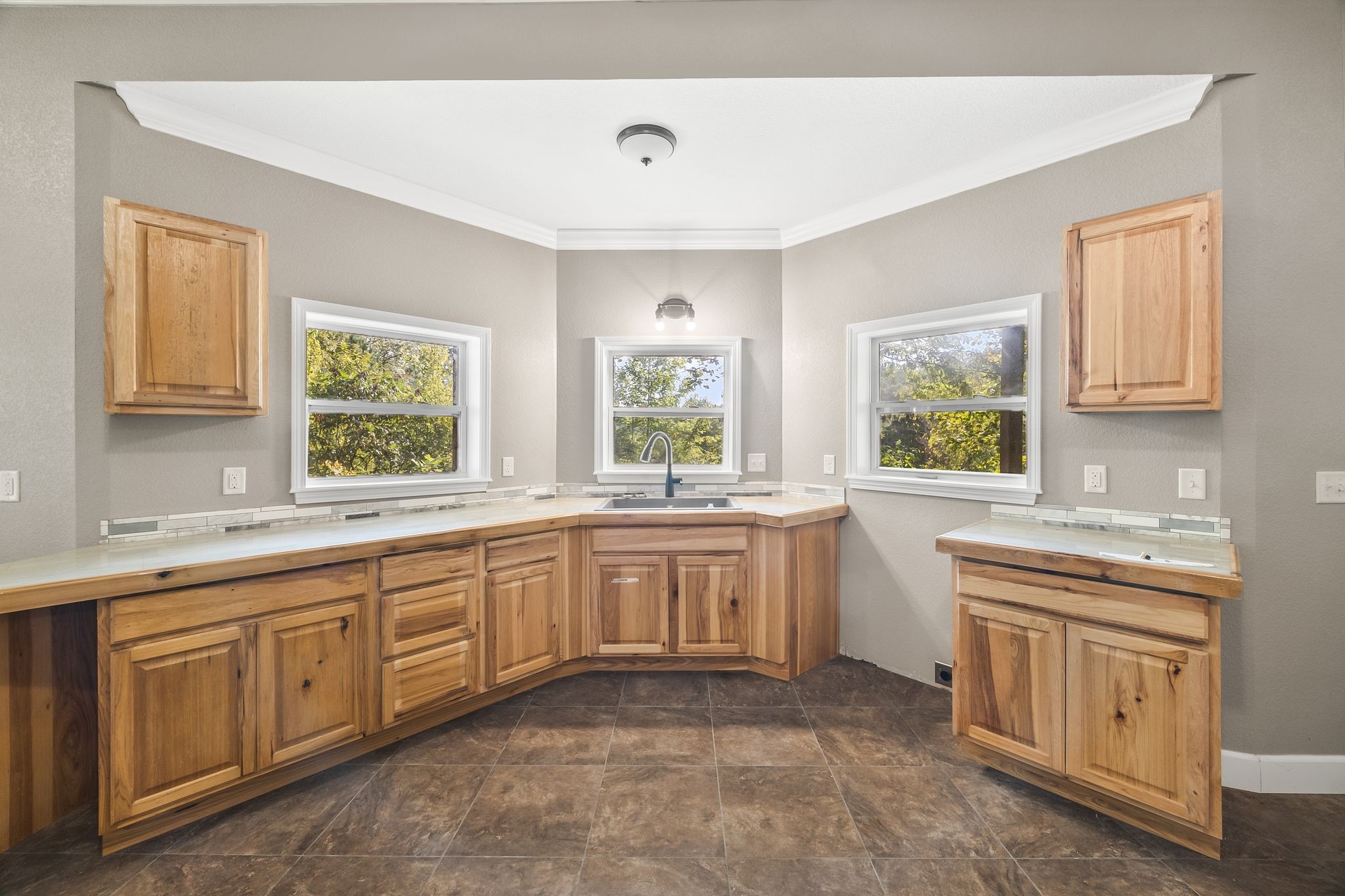 1582 Hellsneck Road Waverly, TN 37185 - Photo 32 of 72 a kitchen with sink cabinets and window