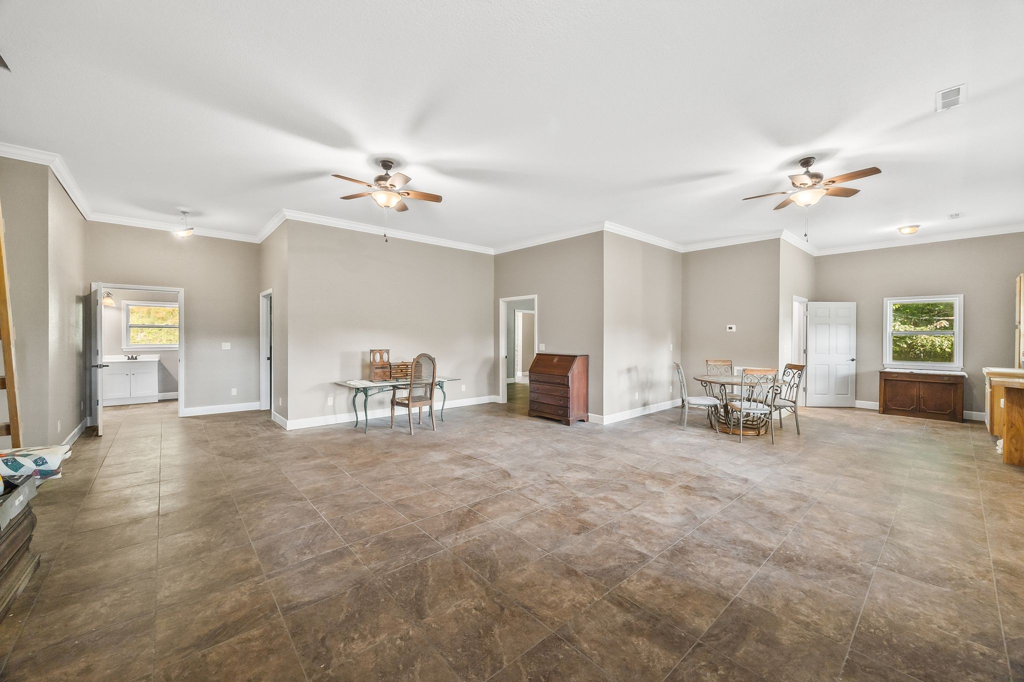 1582 Hellsneck Road Waverly, TN 37185 - Photo 35 of 72 a view of an empty room with window and a kitchen