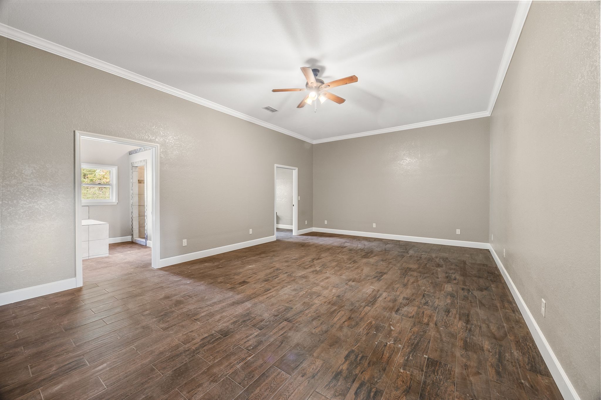 1582 Hellsneck Road Waverly, TN 37185 - Photo 37 of 72 wooden floor in an empty room with a window