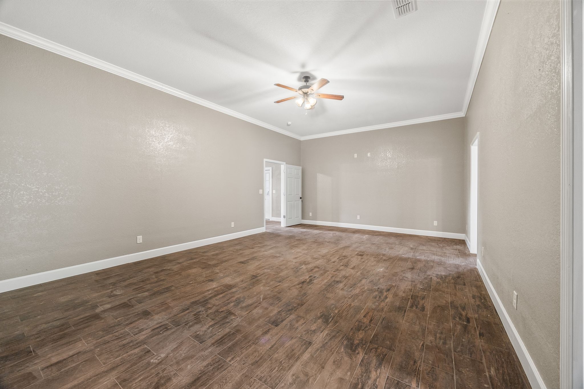 1582 Hellsneck Road Waverly, TN 37185 - Photo 39 of 72 wooden floor in an empty room with a window