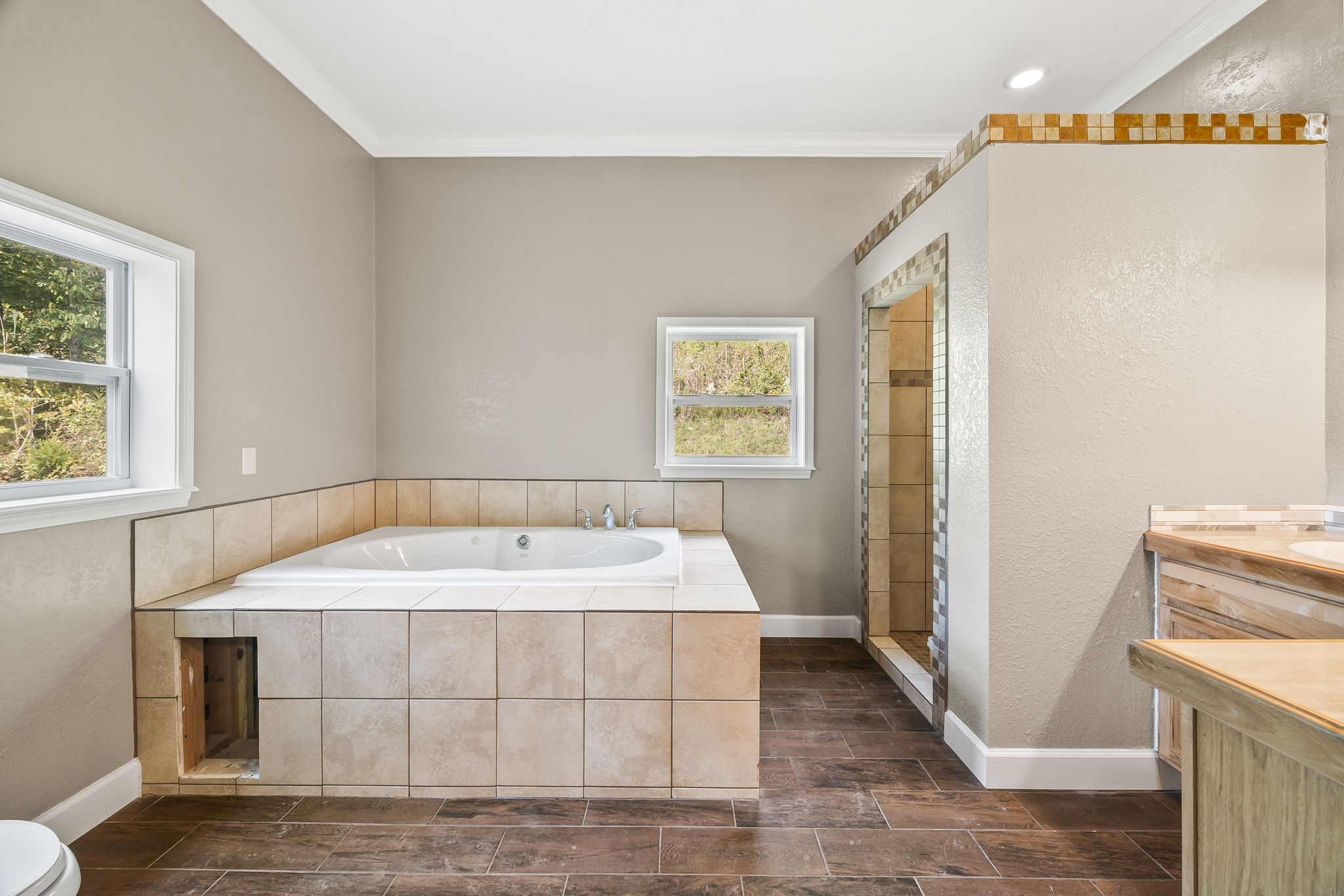 1582 Hellsneck Road Waverly, TN 37185 - Photo 41 of 72 a spacious bathroom with a sink and a mirror