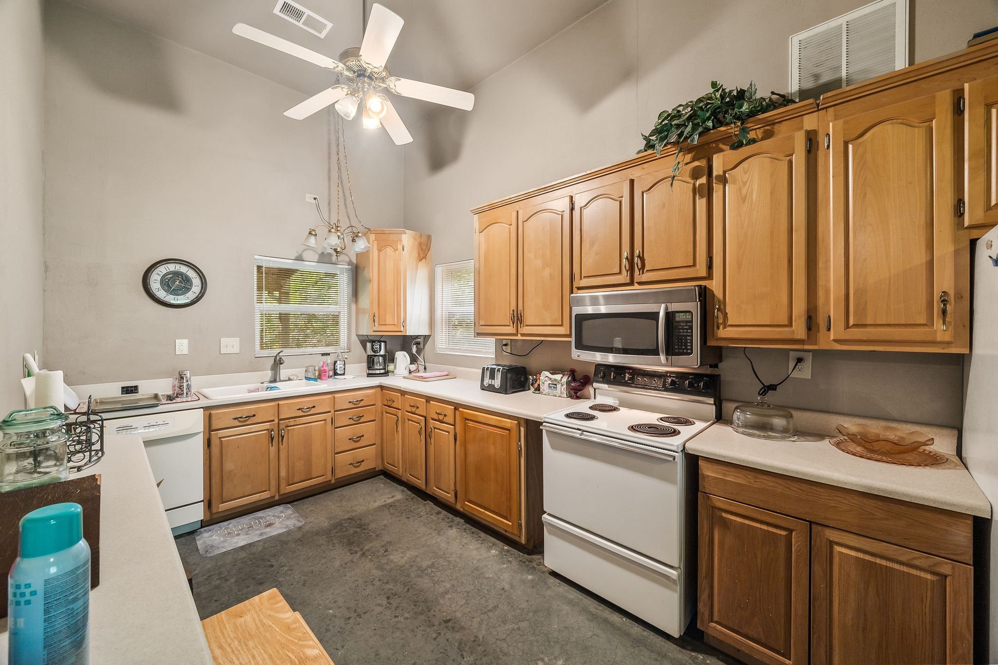 1582 Hellsneck Road Waverly, TN 37185 - Photo 5 of 72 a kitchen with a stove a sink and cabinets