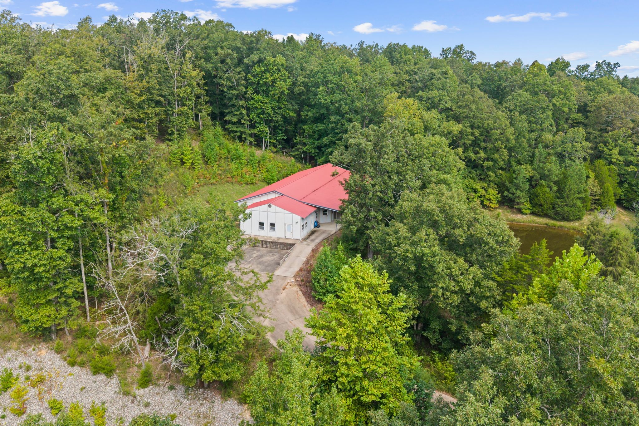1582 Hellsneck Road Waverly, TN 37185 - Photo 57 of 72 an aerial view of a house with a yard and lake view