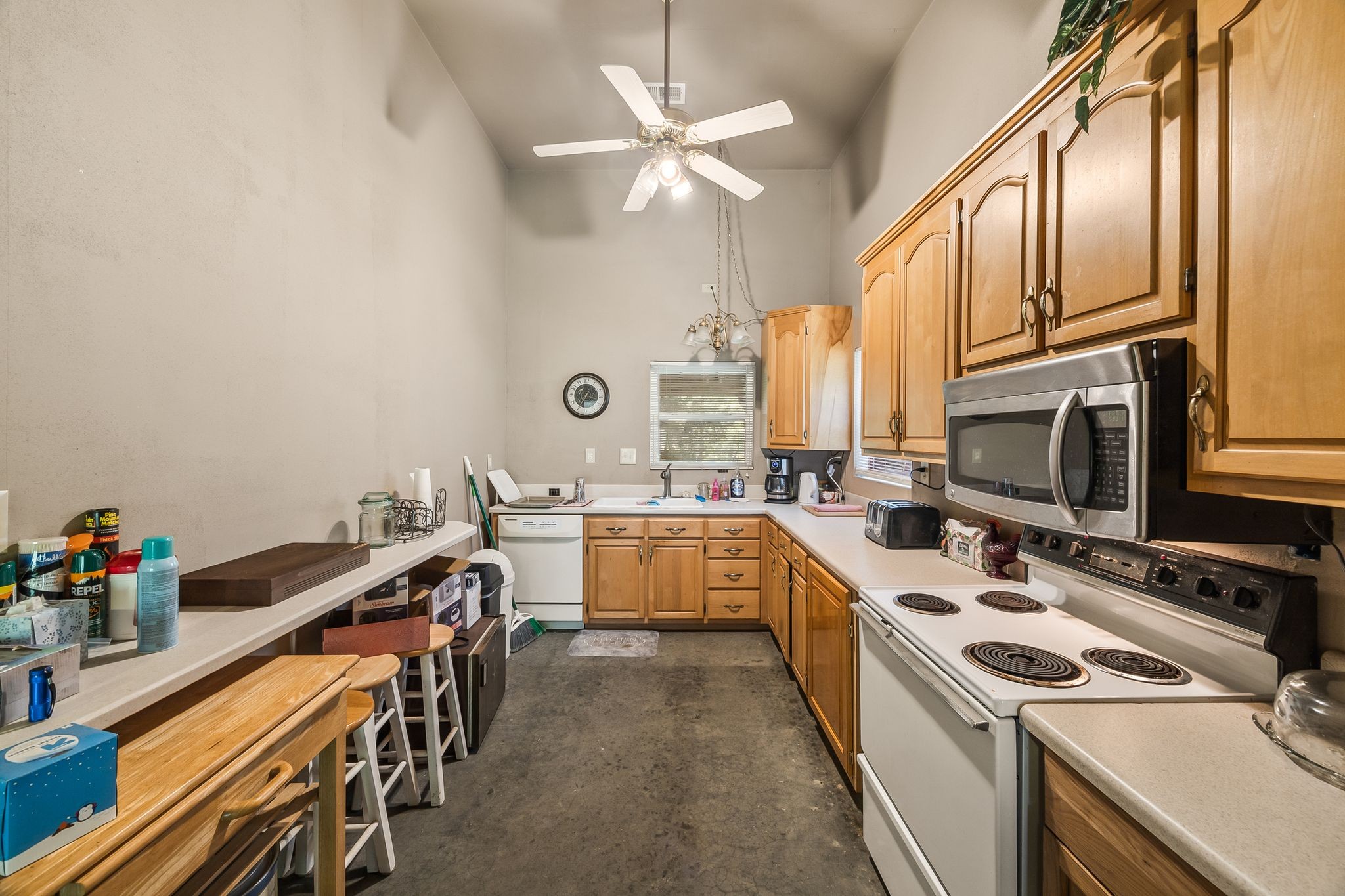 1582 Hellsneck Road Waverly, TN 37185 - Photo 6 of 72 a kitchen with a sink a stove and cabinets