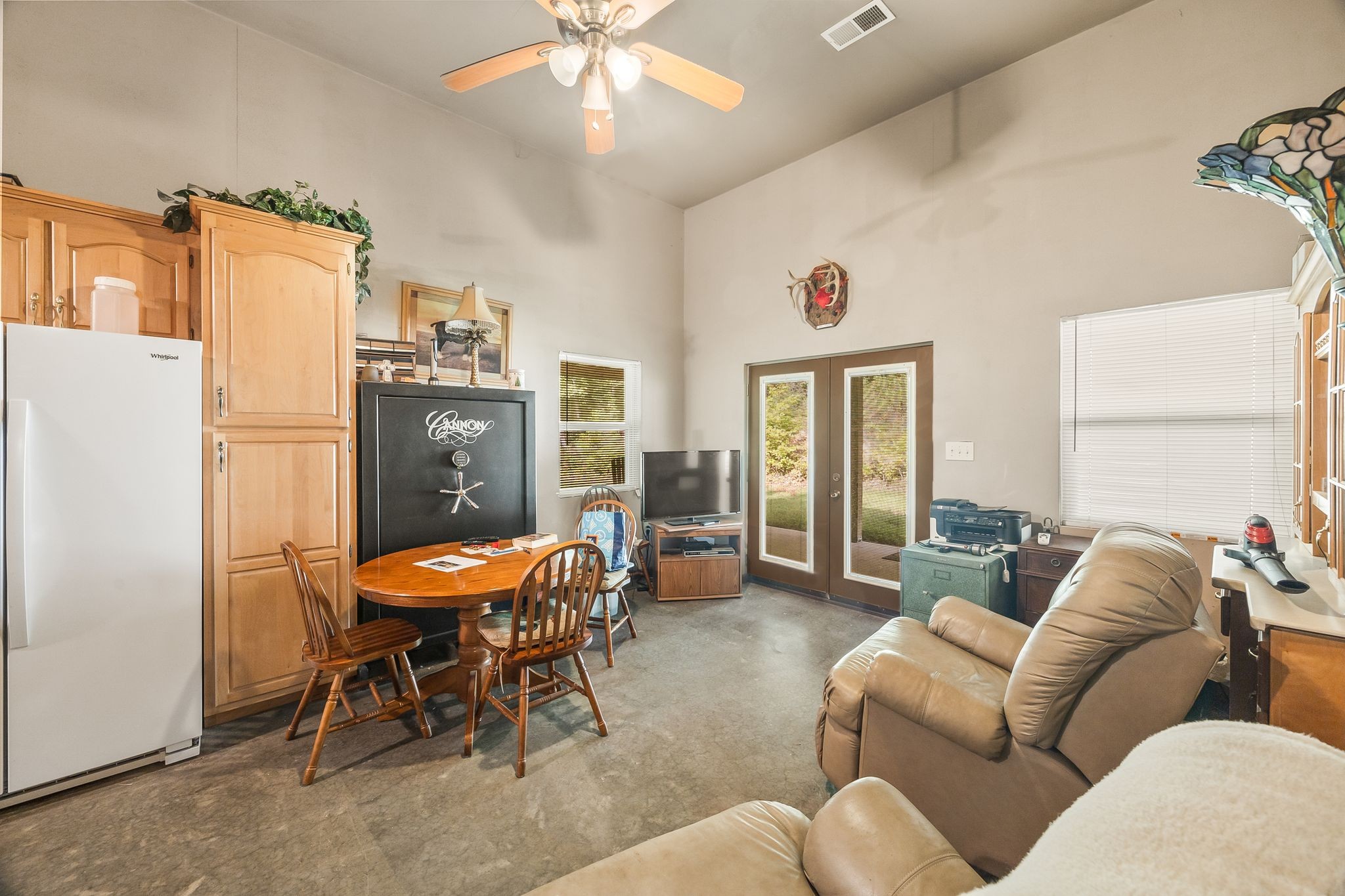 1582 Hellsneck Road Waverly, TN 37185 - Photo 7 of 72 a living room with furniture and a chandelier
