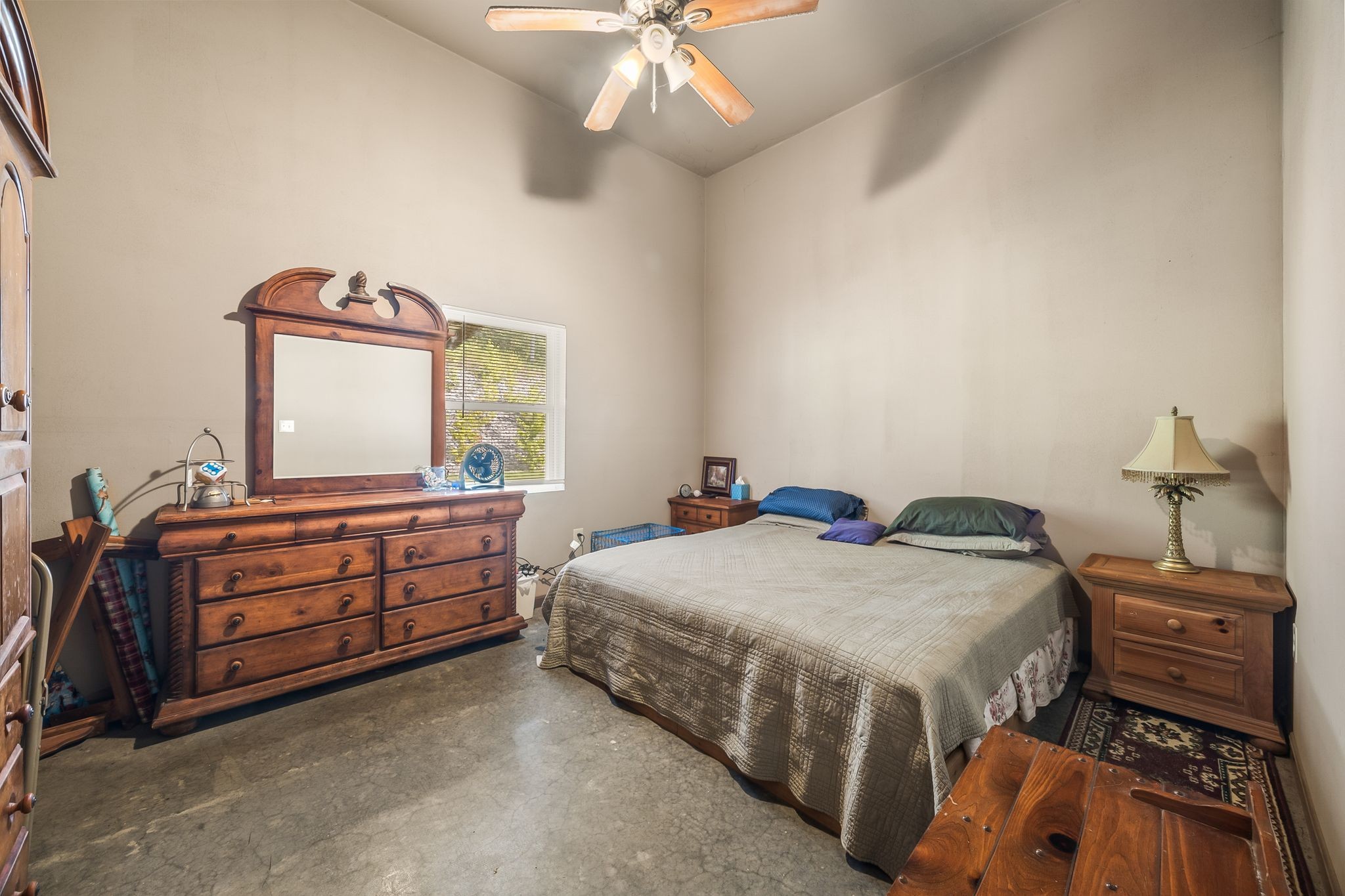 1582 Hellsneck Road Waverly, TN 37185 - Photo 10 of 72 a bedroom with a bed and a chandelier