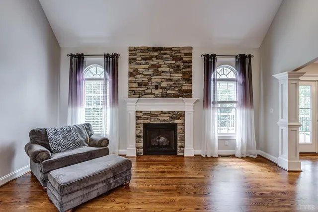 a kitchen with stainless steel appliances granite countertop a stove microwave and cabinets