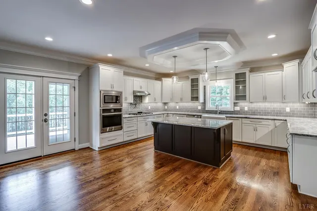 a view of a patio with wooden floor