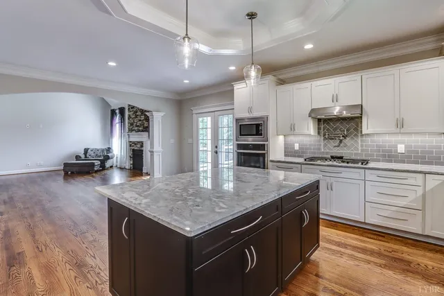 a bathroom with double vanity sinks and a mirror