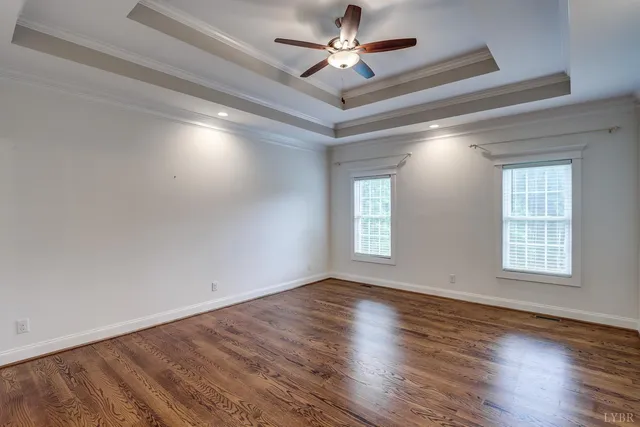 a bathroom with a toilet a sink and a large mirror