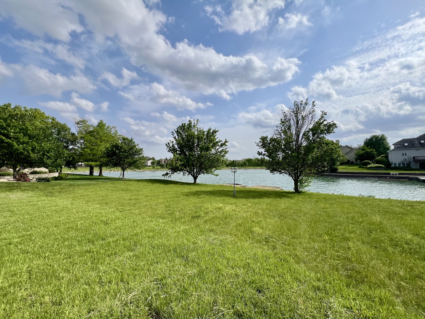 4309 Stonebridge Court Champaign, IL 61822 - Photo 6 of 8 a view of an outdoor space and a yard
