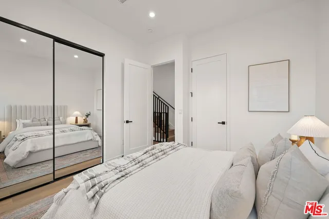 a bathroom with a shower and a sink