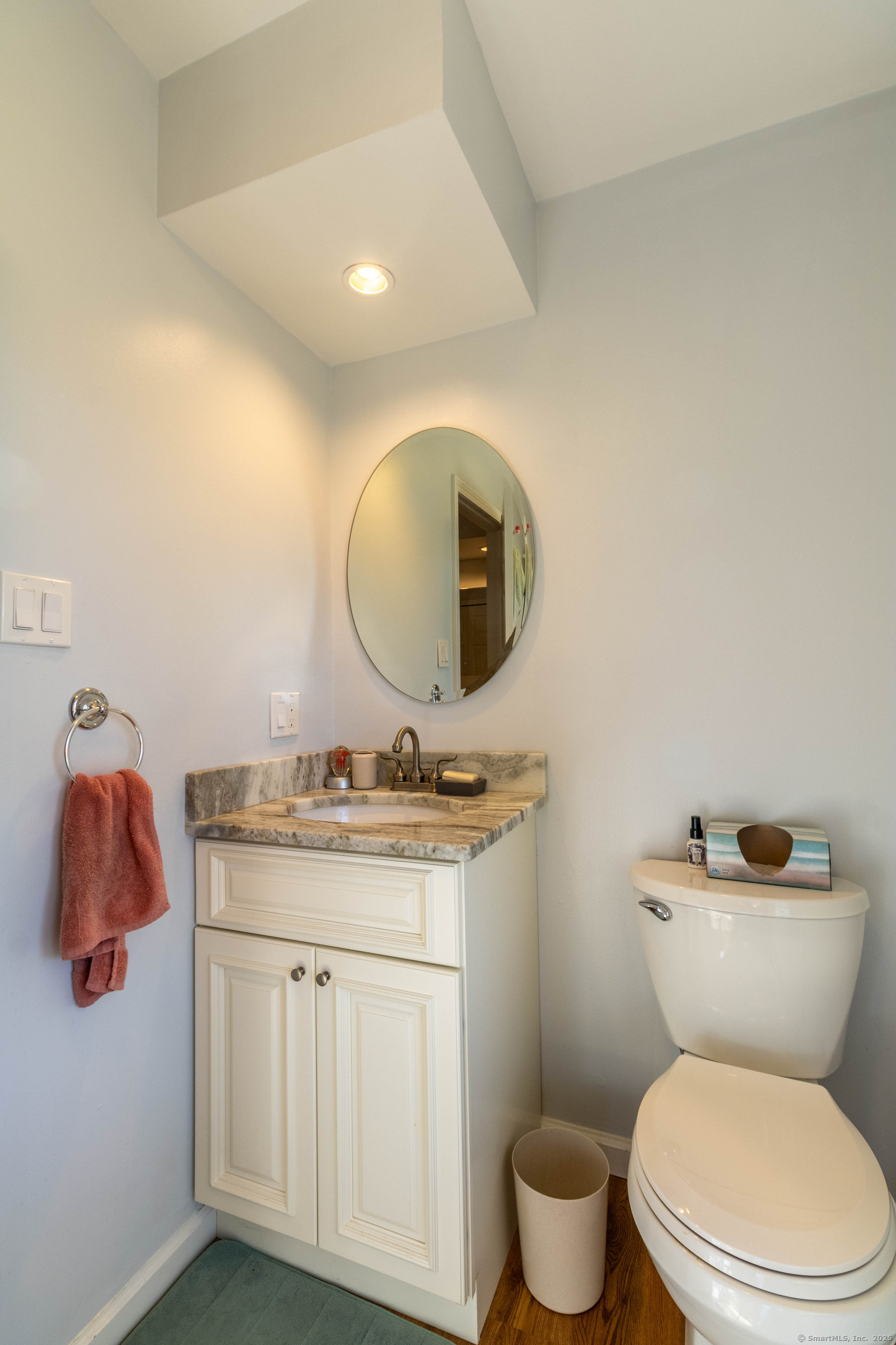 26 Firetown Road Simsbury, CT 06070 - Photo 14 of 40 a bathroom with a granite countertop toilet sink and mirror