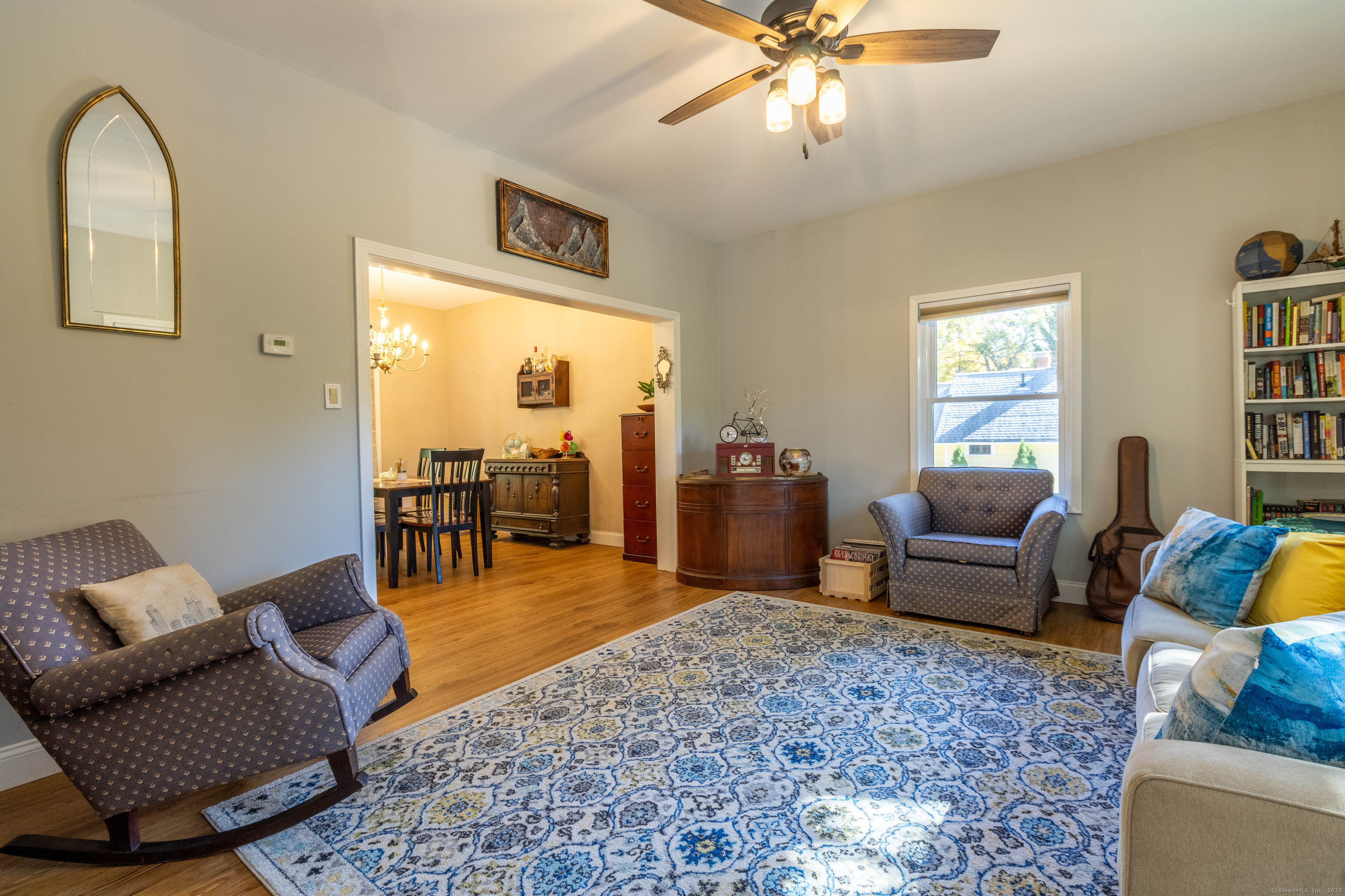 26 Firetown Road Simsbury, CT 06070 - Photo 17 of 40 a living room with furniture and a large window