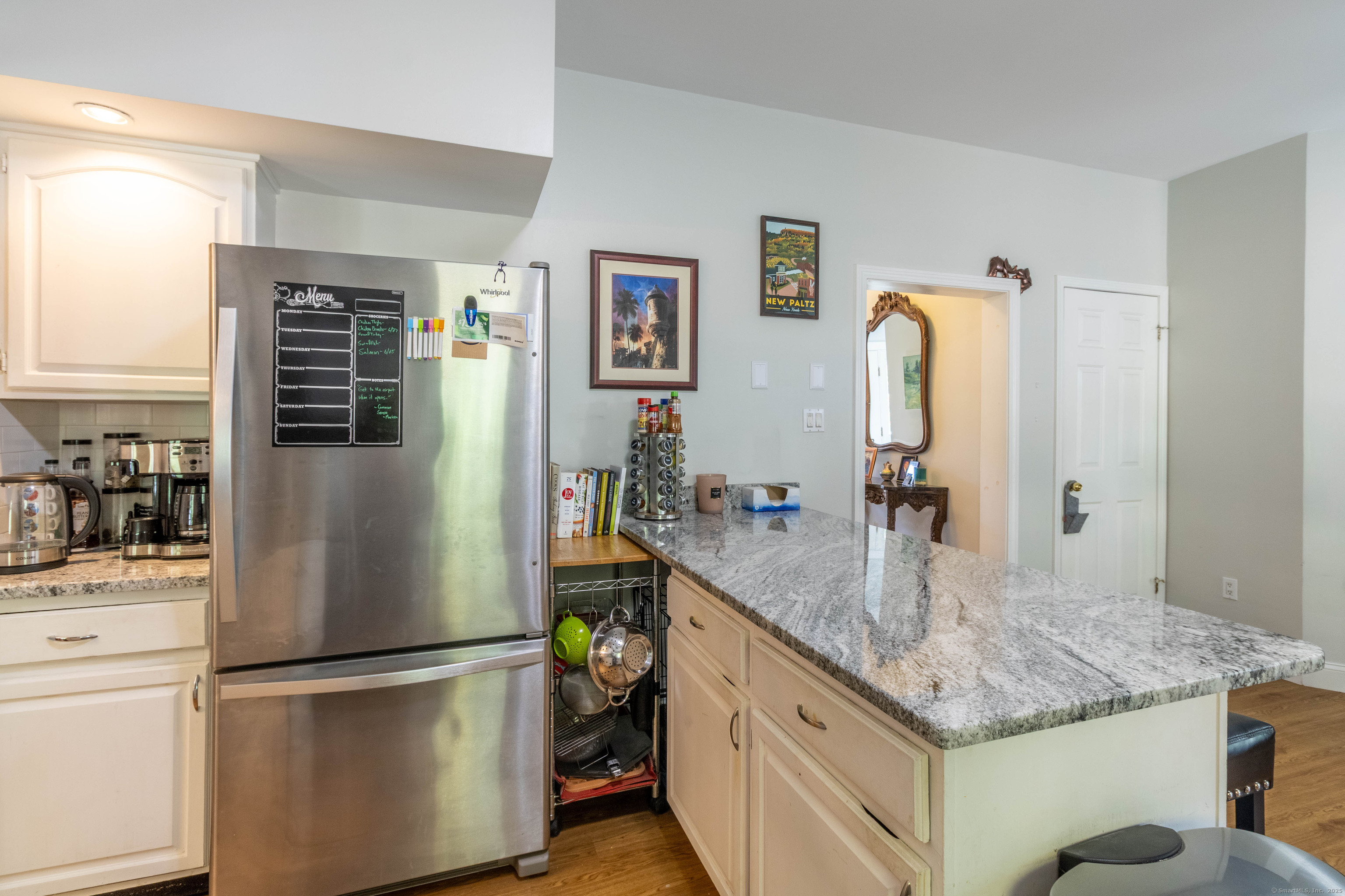 26 Firetown Road Simsbury, CT 06070 - Photo 22 of 40 a kitchen with stainless steel appliances granite countertop a refrigerator and a sink