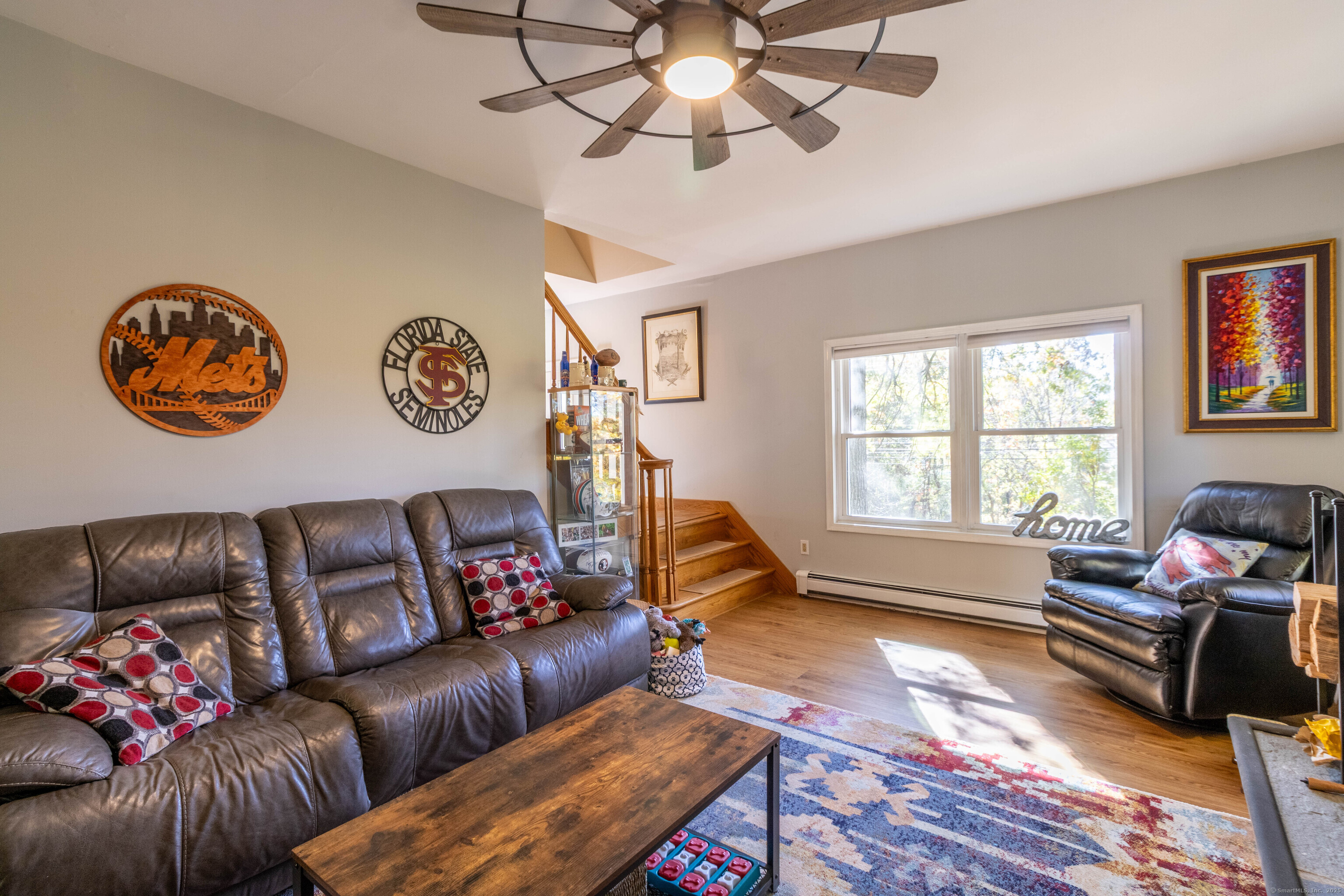 26 Firetown Road Simsbury, CT 06070 - Photo 29 of 40 a living room with furniture and a window