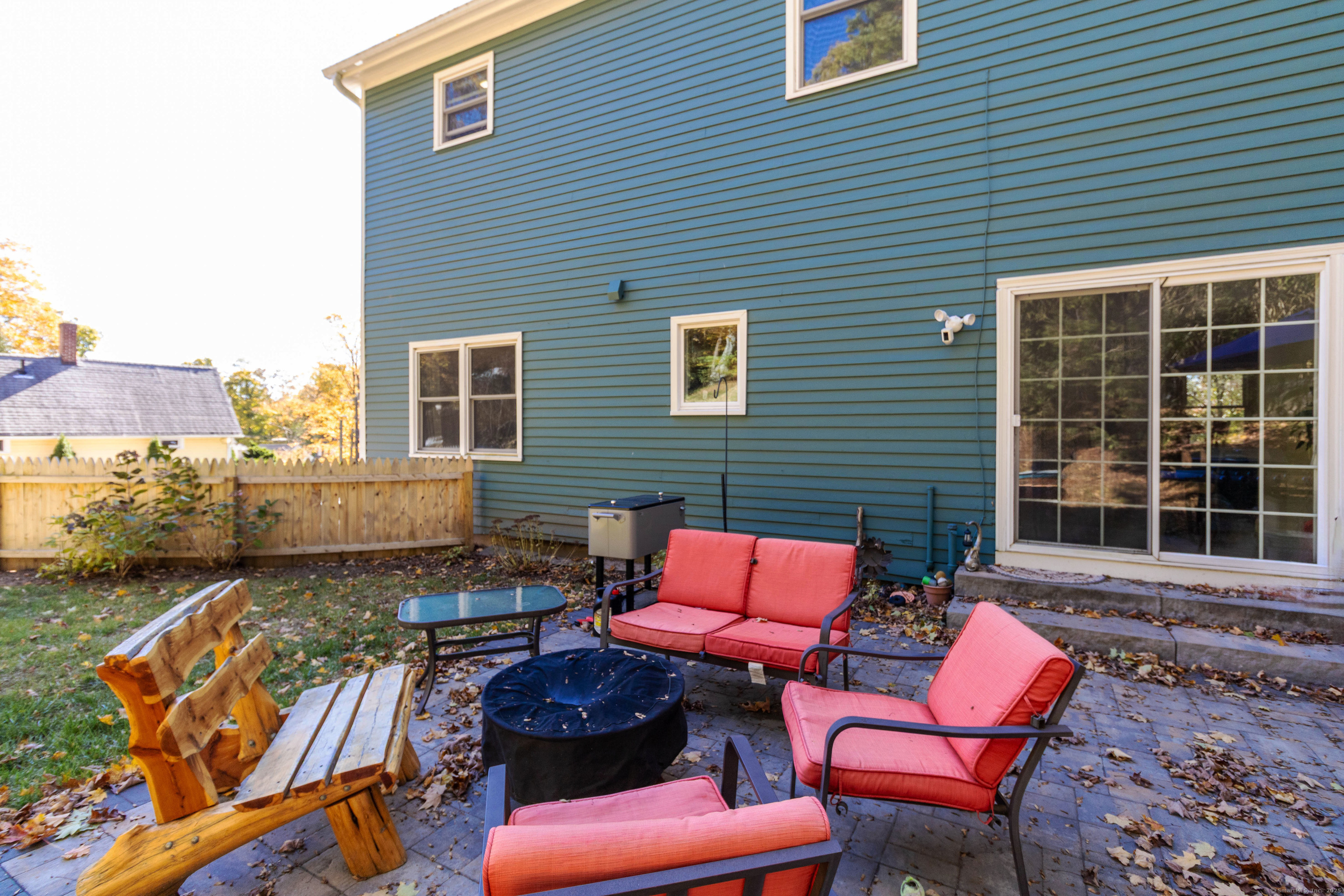 26 Firetown Road Simsbury, CT 06070 - Photo 34 of 40 a backyard of a house with seating space