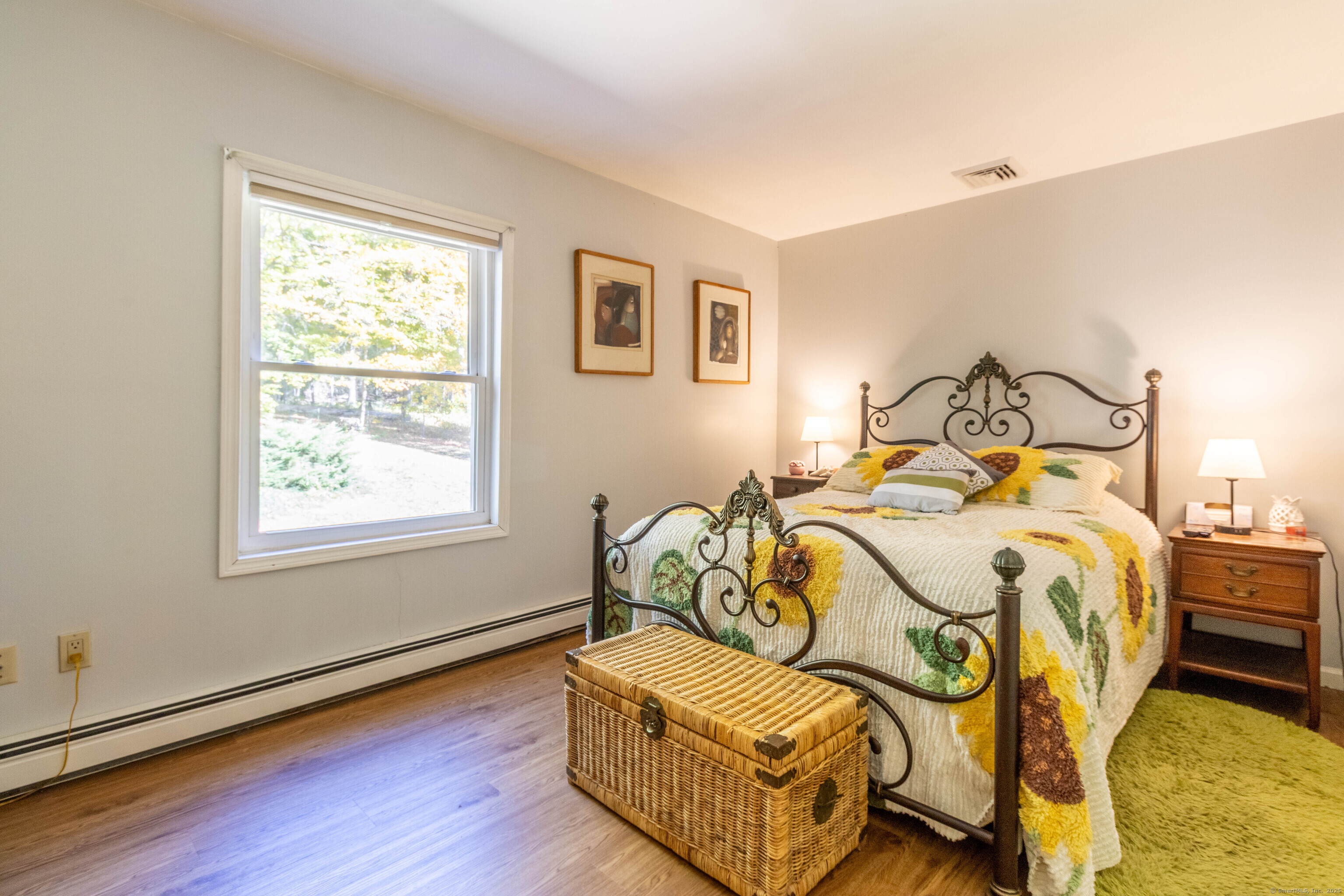 26 Firetown Road Simsbury, CT 06070 - Photo 6 of 40 a bedroom with bed and wooden floor