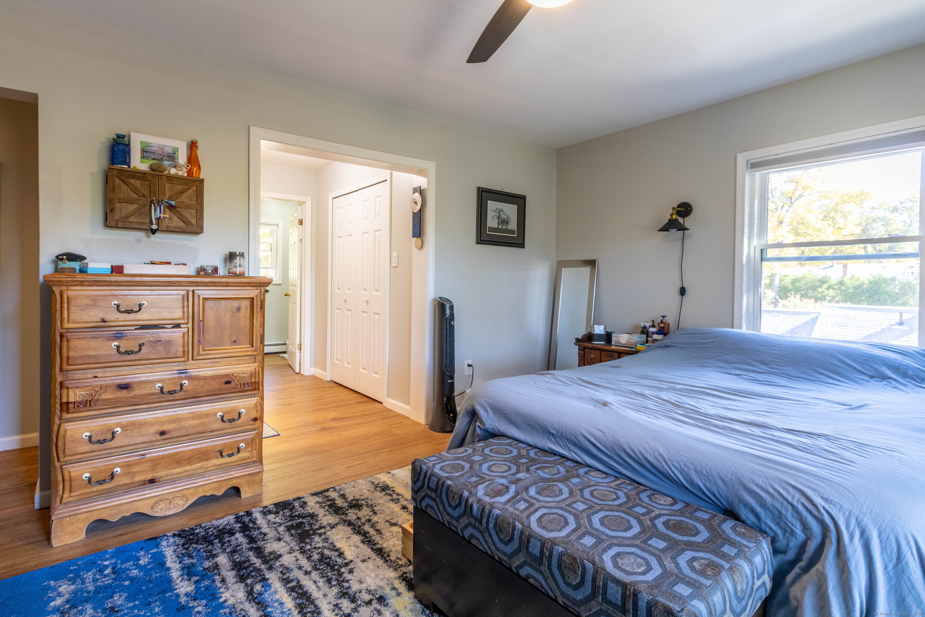 26 Firetown Road Simsbury, CT 06070 - Photo 9 of 40 a bedroom with a bed and furniture