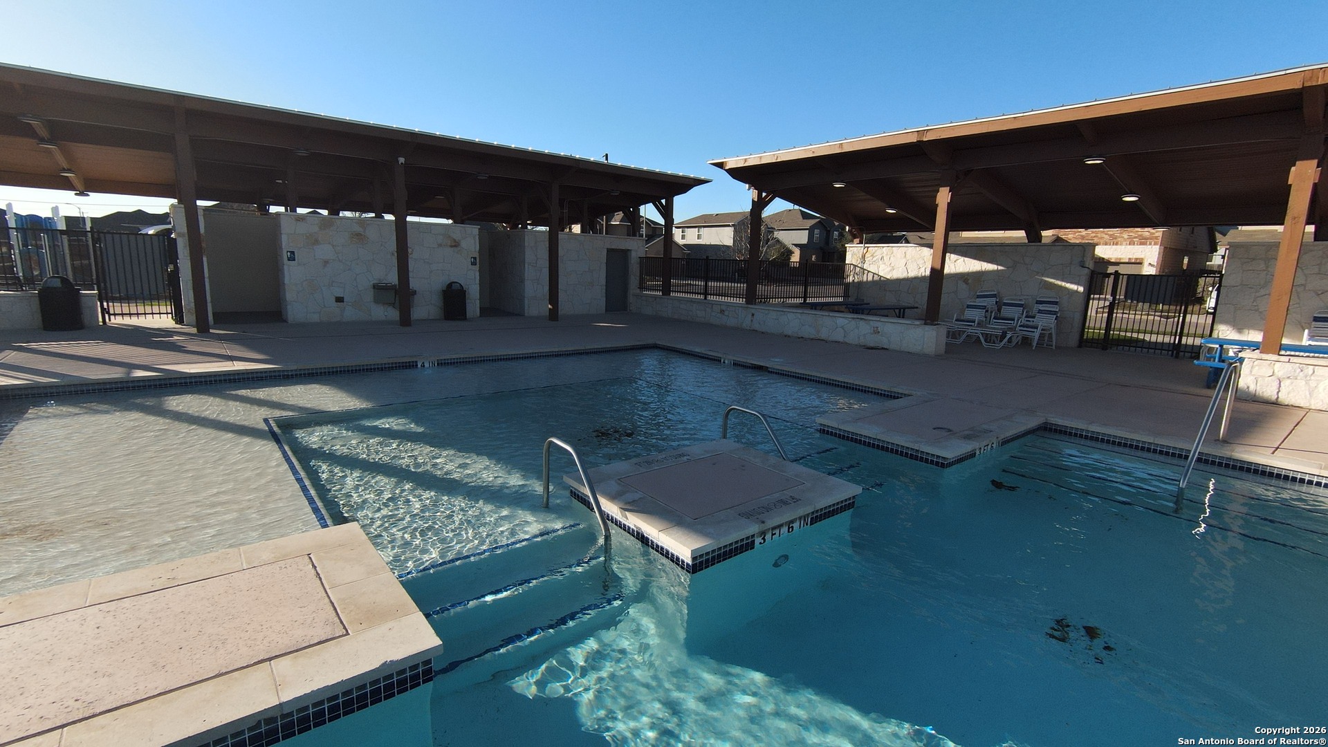 8949 Elizabeth Park Converse, TX 78109 - Photo 33 of 35 a view of a swimming pool with a patio