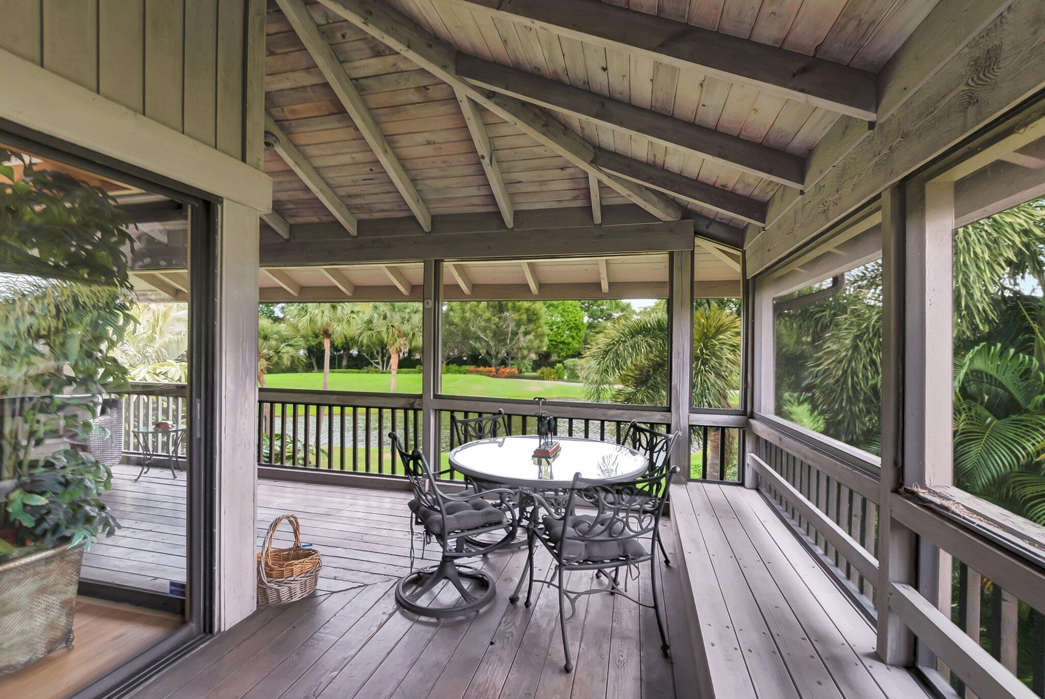 7067 Rain Forest Drive Boca Raton, FL 33434 - Photo 26 of 32 a view of a chairs and table in the balcony