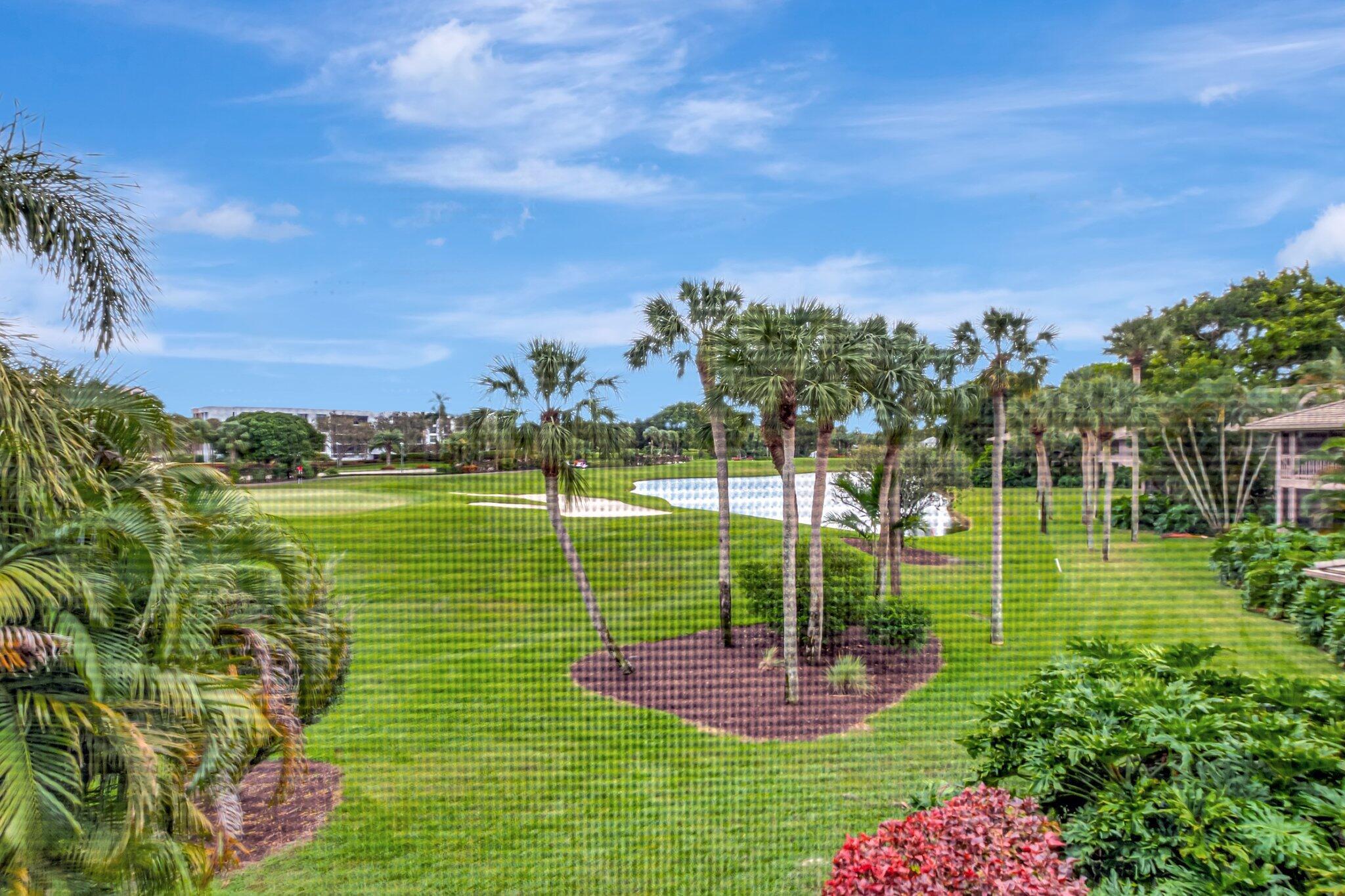 7067 Rain Forest Drive Boca Raton, FL 33434 - Photo 27 of 32 a view of a garden