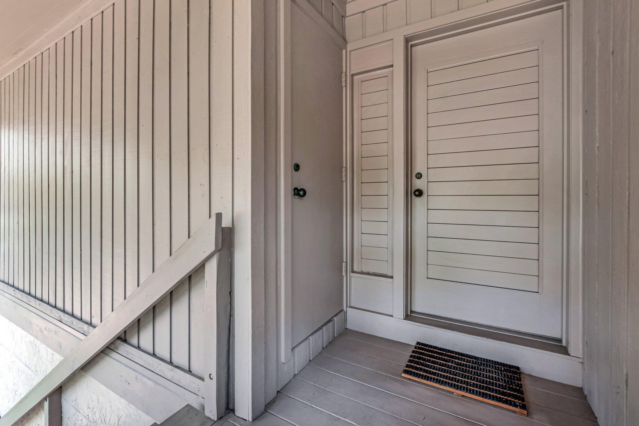 7067 Rain Forest Drive Boca Raton, FL 33434 - Photo 29 of 32 a view of a porch with wooden floor