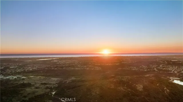 an aerial view of a city with lots of residential buildings