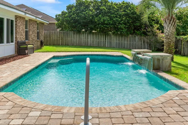 a view of a house with a yard porch and sitting area